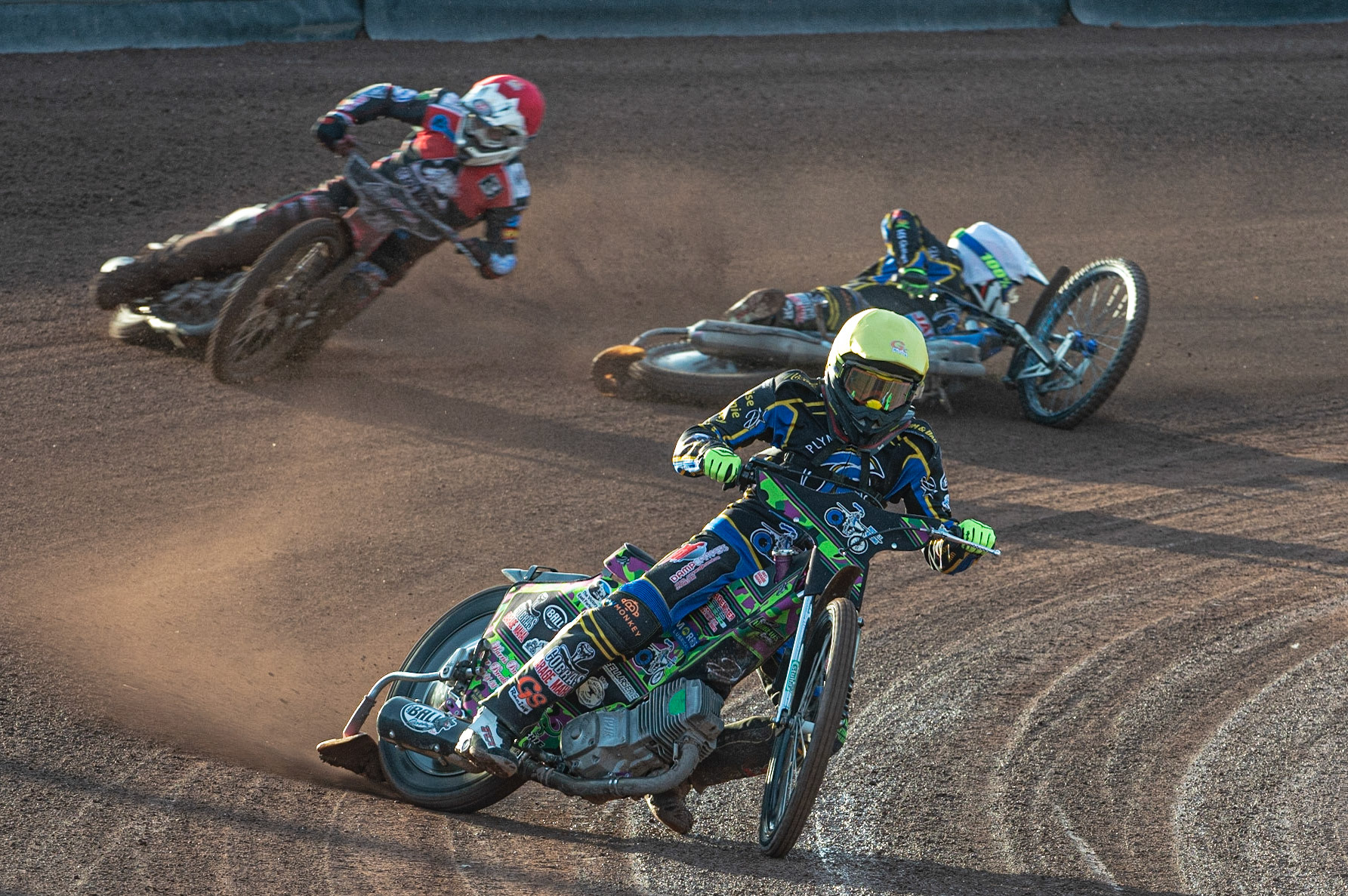 Photo: Ian Charles

Richard Andrews (Yellow) leads as Scott Campos  (White) is a faller and Danny Phillips  lays down after avoiding him

Belle Vue Colts v Plymouth Gladiators National League, Belle Vue National Speedway Stadium, Manchester, Thursday 23  May  2019