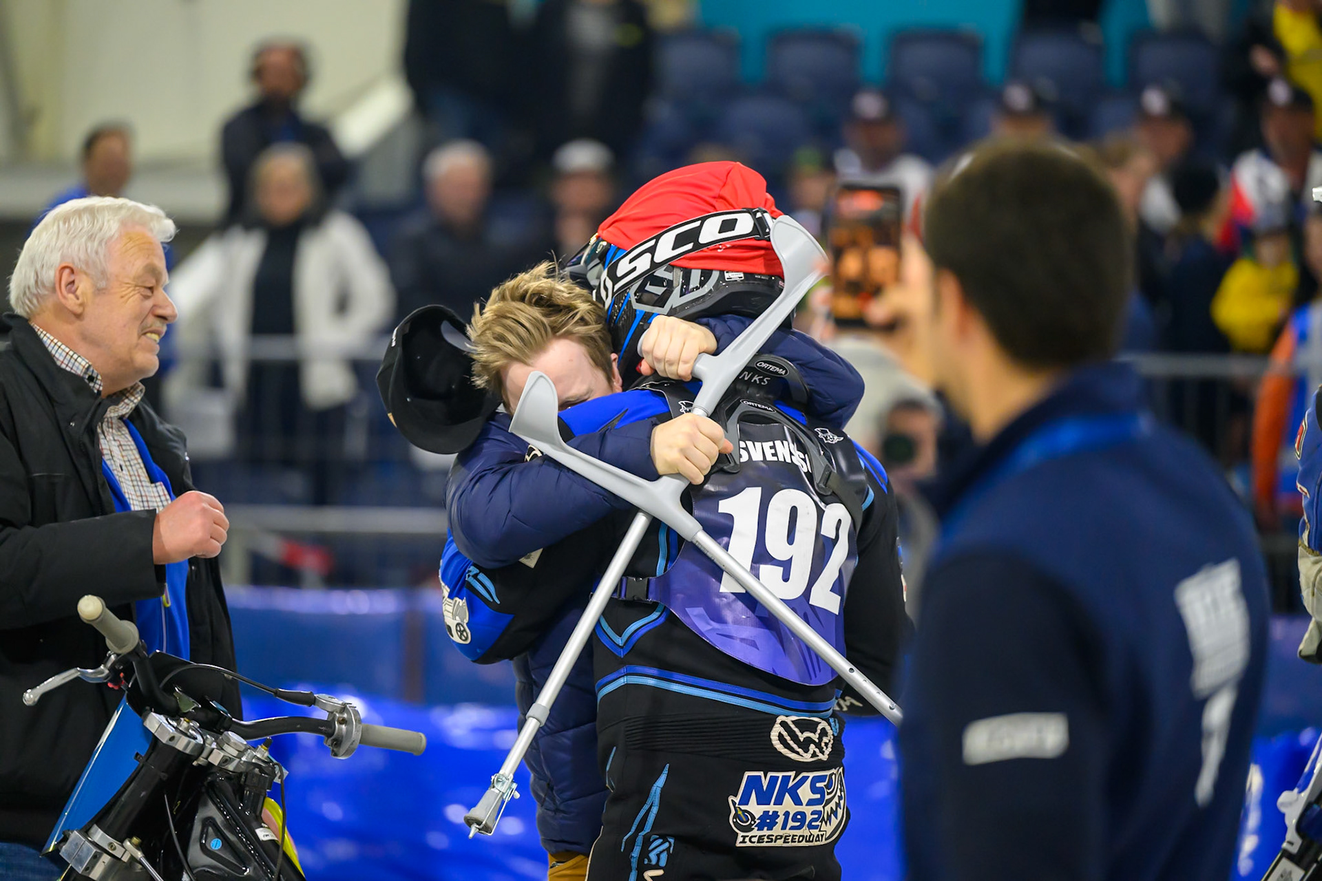Niclas Svensson (192) of Sweden  is congratulated by Martin Haarahiltunen on winning the World Championship during the FIM Ice Speedway Gladiators World Championship Final 3 at Ice Rink Thialf, Heerenveen on Saturday 11th April 2026. (Photo: Ian Charles | MI News)