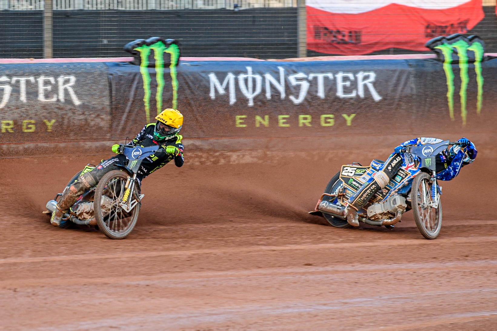 Martin Vaculik (54) of Slovakia in Yellow leading Jack Holder (25) of Australia in Blue during the ATPI FIM Speedway Grand Prix Round 5 at the National Speedway Stadium, Manchester, on Saturday 14th June 2025. (Photo: Ian Charles | MI News)