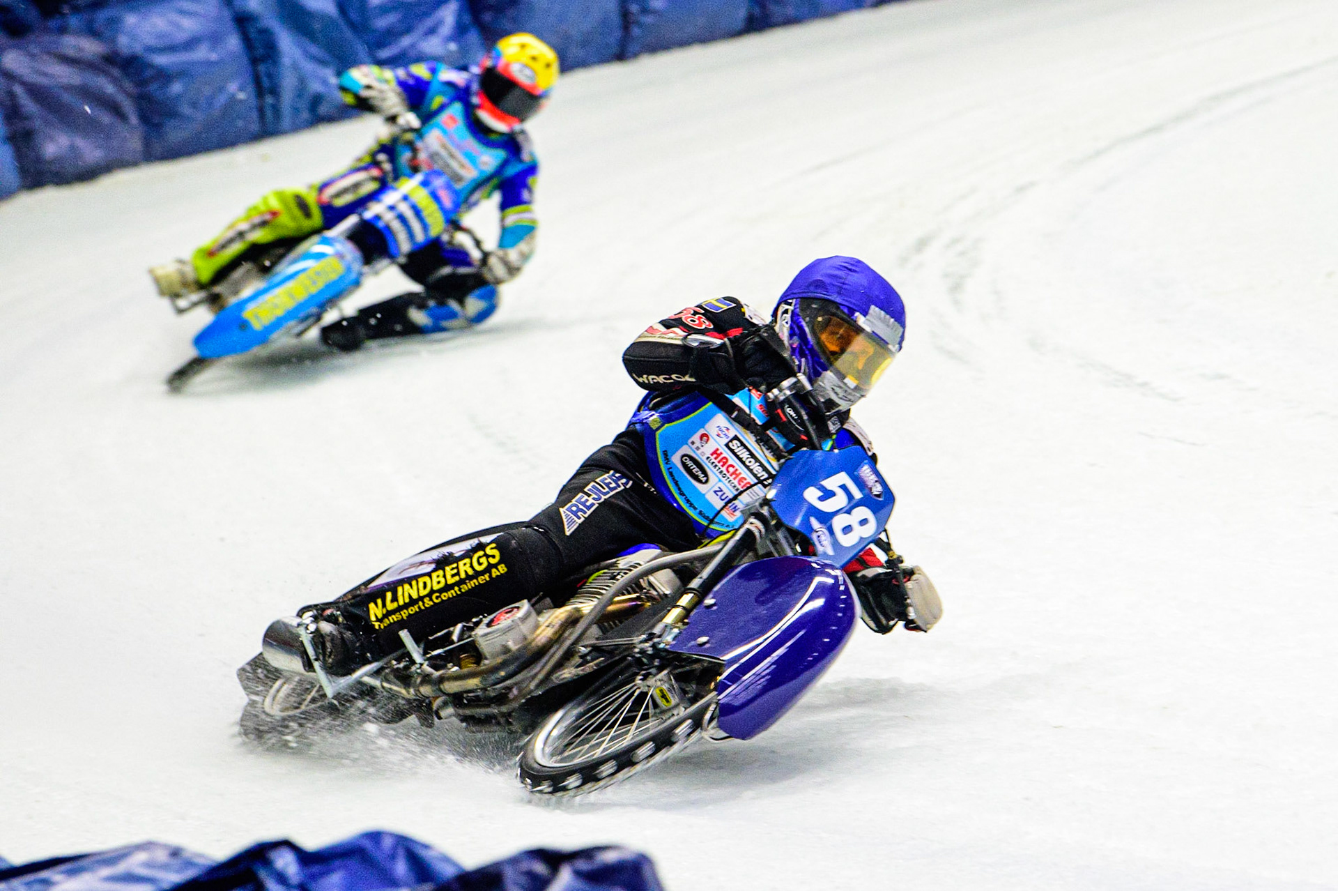 Stefan Svensson (Blue) leads Günther Bauer (Yellow)  during the Race of Legends at the Max-Aicher-Arena, Inzell on Friday 17th March 2023. (Photo: Ian Charles | MI News)