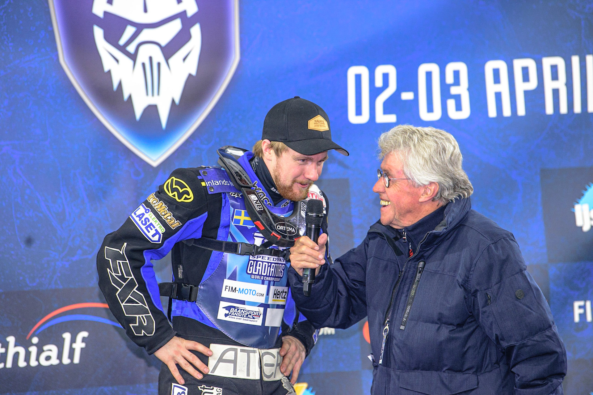 HEERENVEEN, NL. 199 gives a quick interview to Jan De Rory  during the FIM Ice Speedway Gladiators World Championship Final 4 at Ice Rink Thialf, Heerenveen on Sunday  3 April 2022. (Credit: Ian Charles | MI News)