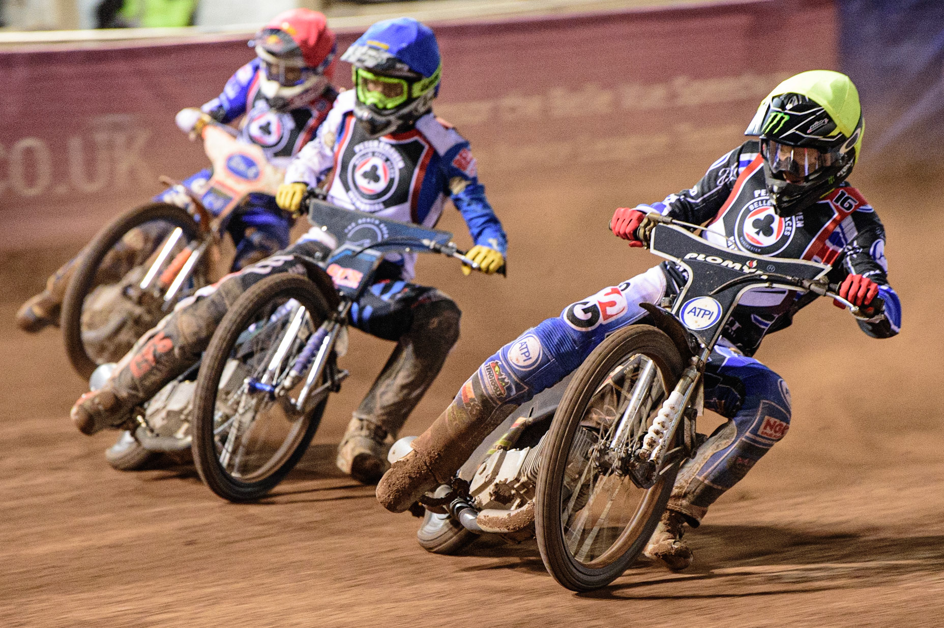 MANCHESTER, UK. MAR 21ST.  Dan Bewley (Yellow) inside Adam Ellis  (Blue) and Robert Lambert (Red) during the ATPI Peter Craven Memorial Trophy at the National Speedway Stadium, Manchester on Monday 21st March 2022. (Credit: Ian Charles | MI News)
