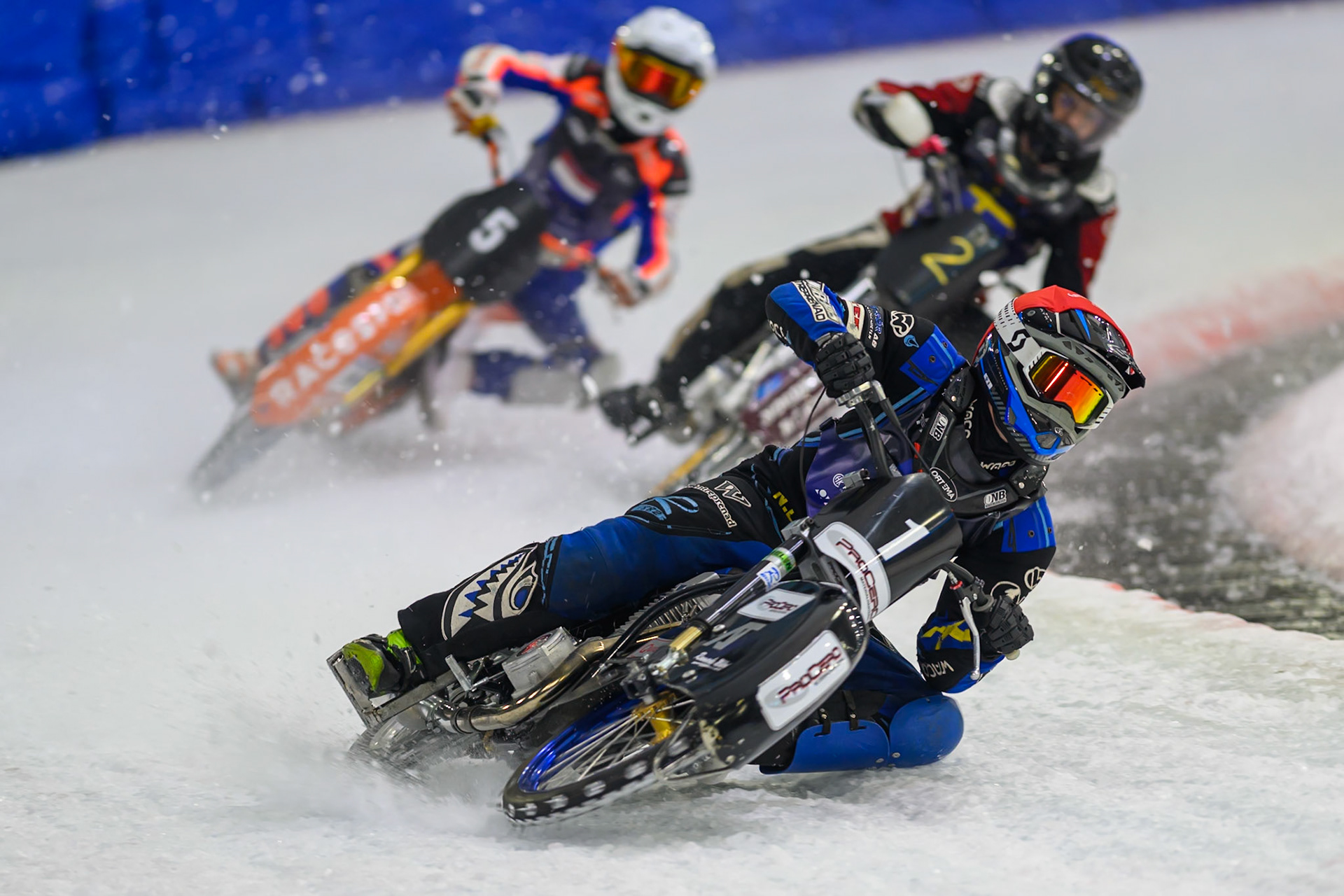 Niclas Svensson (1) of Sweden  in Red leading Ove Ledstrom (2) of Sweden  in Blue and Jasper Iwema (5) of The Netherlands  in White during the FIM Ice Speedway Of Nations at Ice Rink Thialf, Heerenveen on Sunday 12th April 2026. (Photo: Ian Charles | MI News)