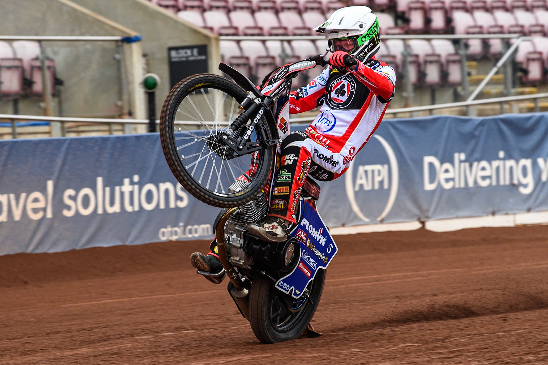 Belle Vue Aces' rider Dan Bewley pulls a wheelie during the Belle Vue Aces Media Day at the National Speedway Stadium, Manchester on Monday 11th March 2024. (Photo: Ian Charles | MI News)