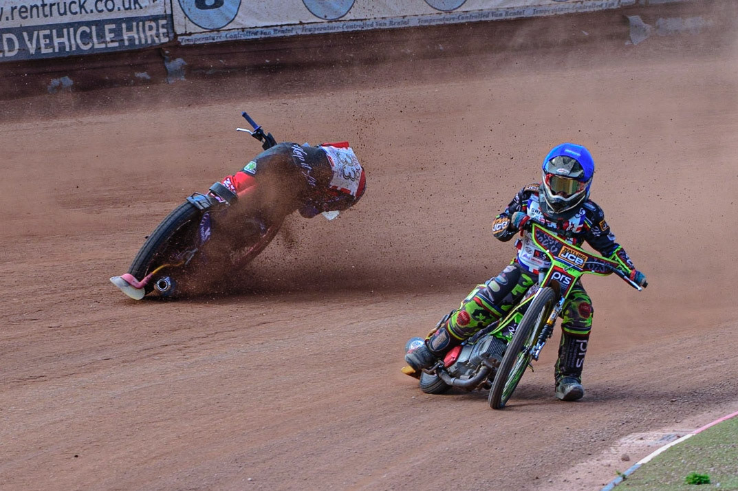 MANCHESTER, UK. JUN 3RD Charlie Wood (33) (Red) crashes behind William Cairns (145)  (Blue) during the British Youth Speedway Championship (Round 4)  at the National Speedway Stadium, Manchester on Friday 3rd June 2022. (Credit: Ian Charles | MI News)