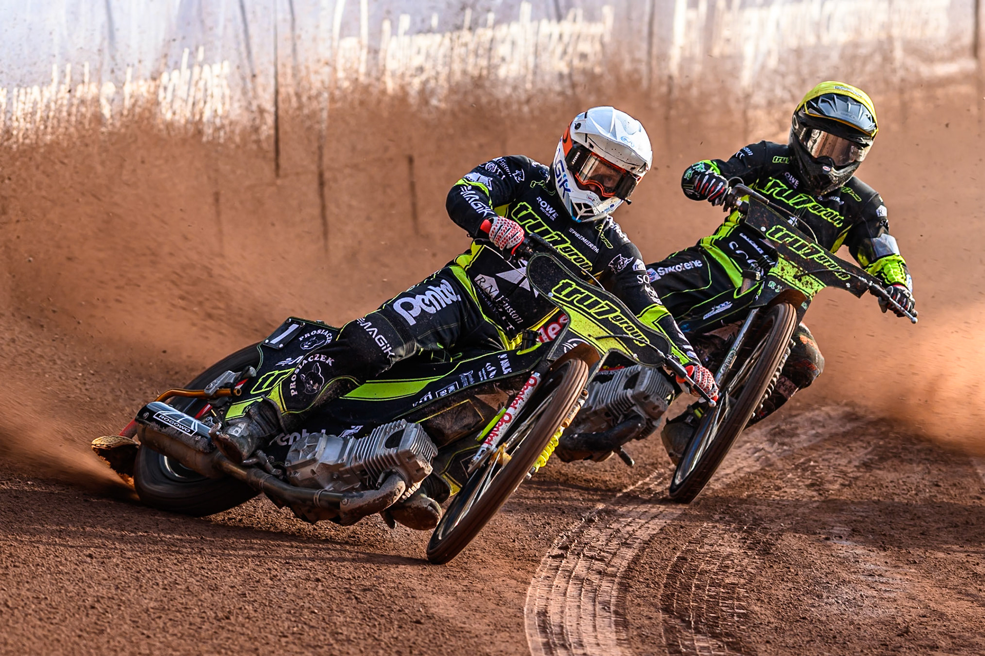 Ipswich Witches' Emil Saifutdinov  in White leading team mate Danny King in Yellow during the Rowe Motor Oil Premiership match between Belle Vue Aces and Ipswich Witches at the National Speedway Stadium, Manchester on Monday 30th June 2025. (Photo: Ian Charles | MI News)