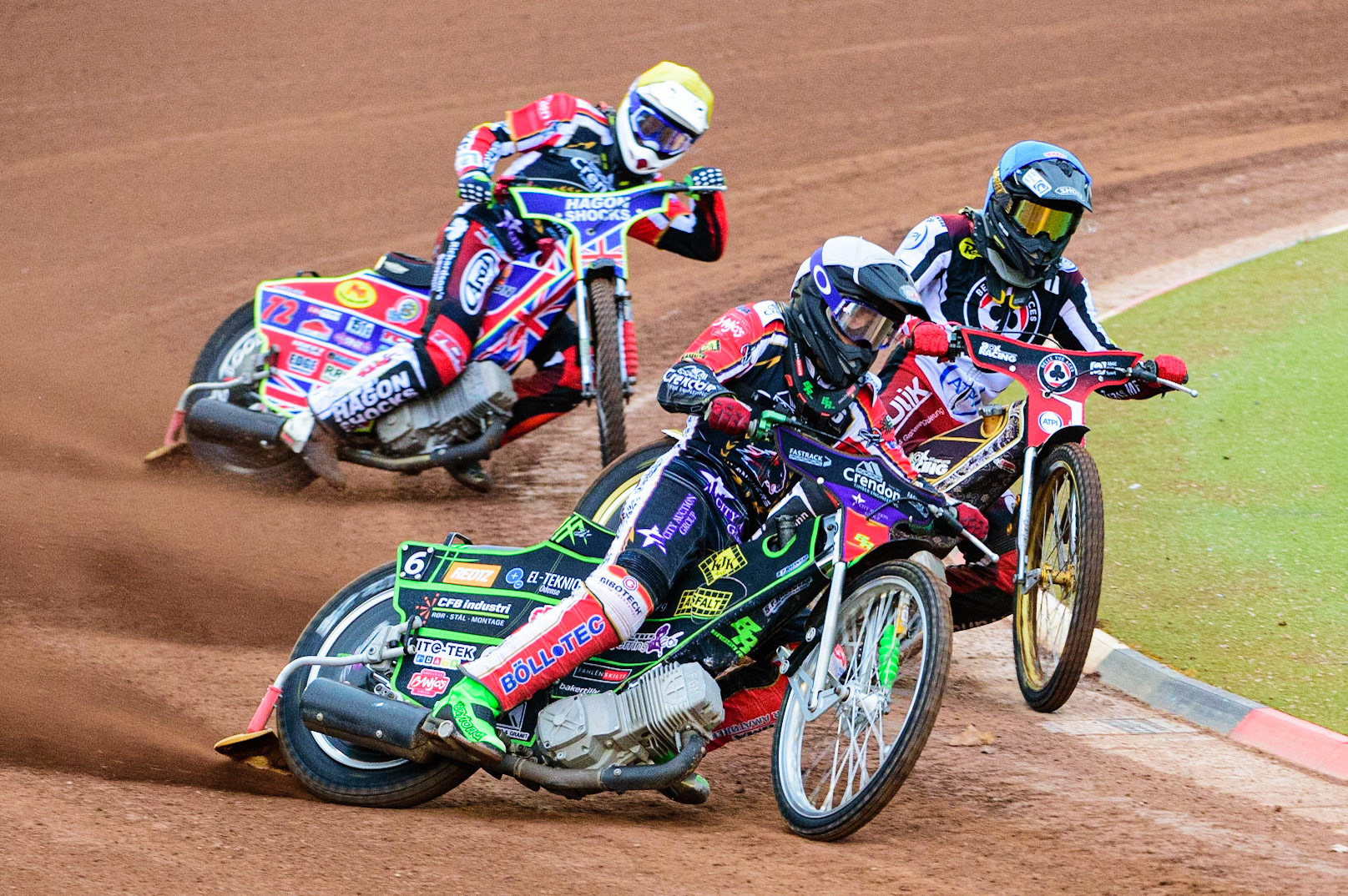 Benjamin Basso  (White) leads Norick Blödorn  (Blue) and Jake Mulford  (Yellow) during the SGB Premiership match between Belle Vue Aces and Peterborough at the National Speedway Stadium, Manchester on Monday 25th July 2022. (Credit: Ian Charles | MI News