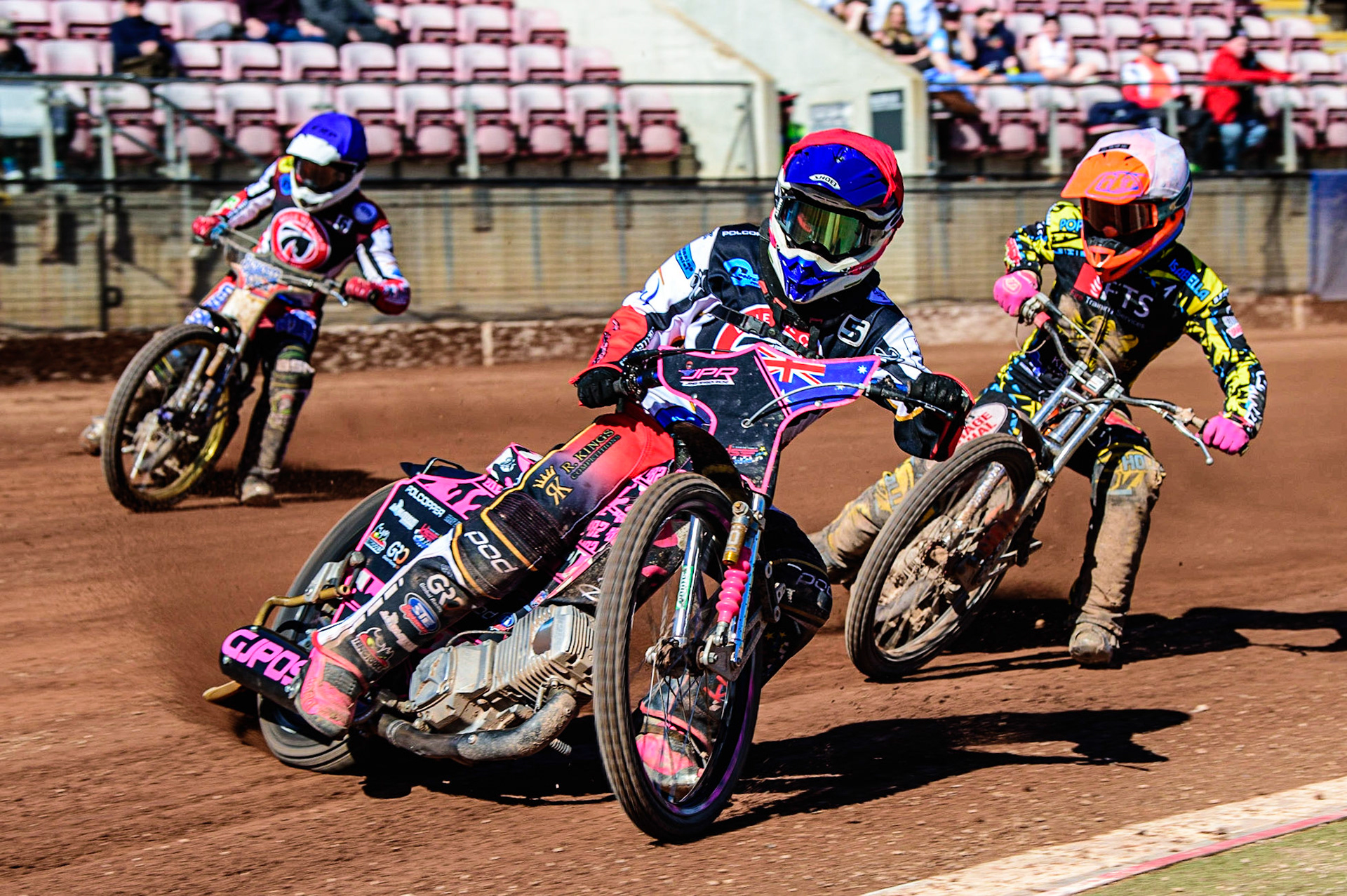 James Pearson   (Red) leads Connor Coles  (White) and Paul Bowen   (Blue) during the National Development League match between Belle Vue Colts and Berwick Bullets at the National Speedway Stadium, Manchester on Friday 7th April 2023. (Photo: Ian Charles | MI News)