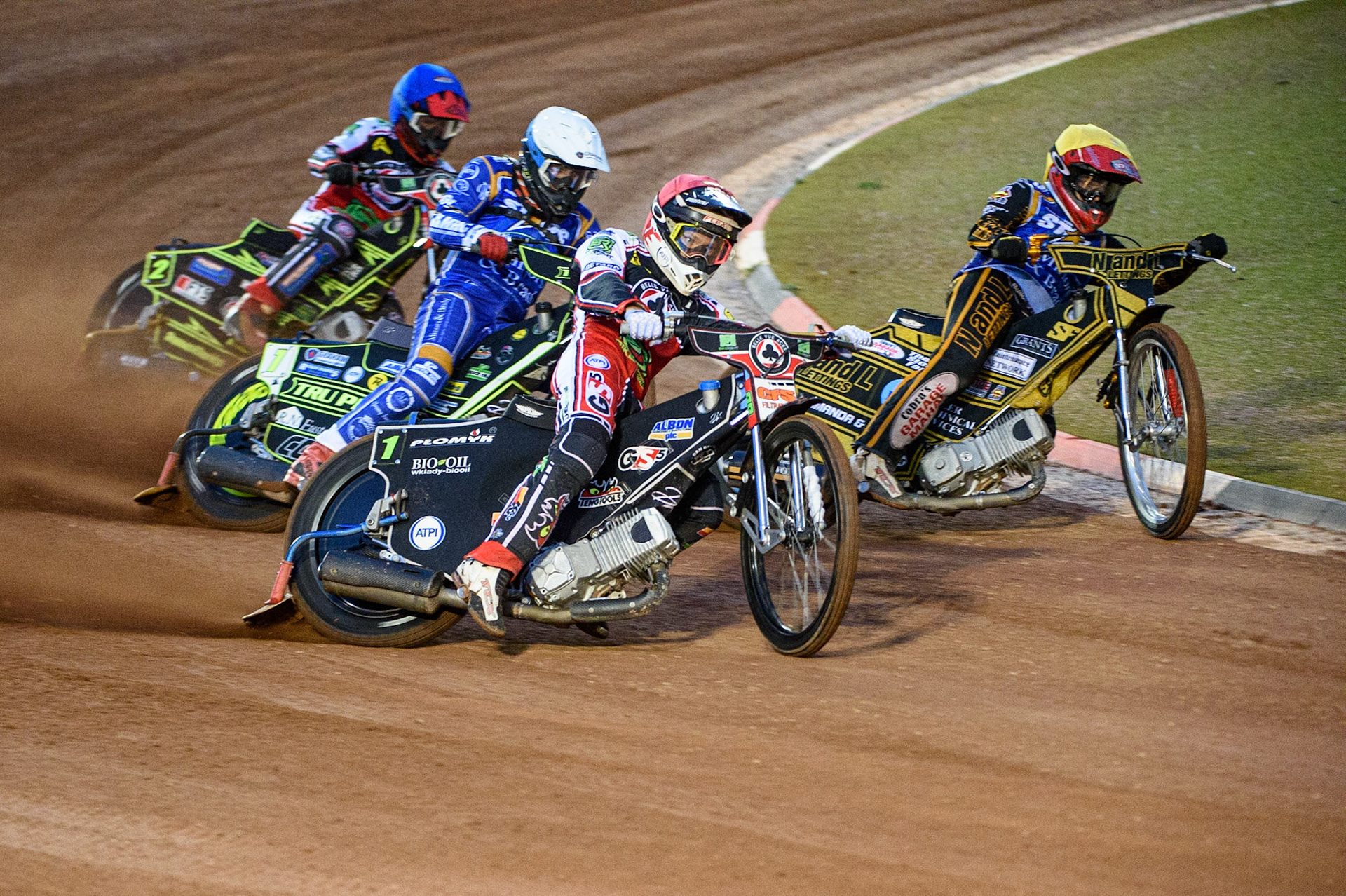 MANCHESTER, UK. SEPT 13TH  Dan Bewley  (Red) outside Ben Barker (Yellow) with Craig Cook  (White) and Jye Etheridge  (Blue) behind during the SGB Premiership match between Belle Vue Aces and King's Lynn Stars at the National Speedway Stadium, Manchester on Monday 13th September 2021. (Credit: Ian Charles | MI News)