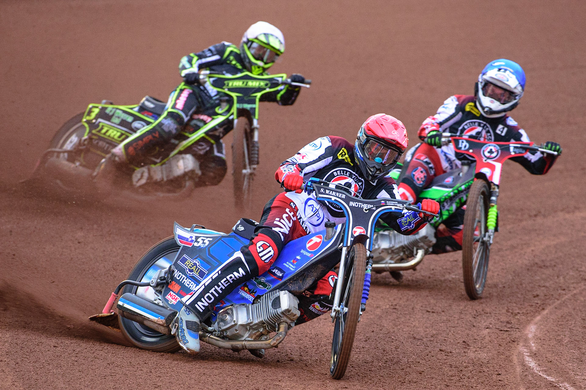 MANCHESTER, UK. JUN 6TH  Matej Žagar  (Red) and Charles Wright (Blue) lead Danny King  (White) during the SGB Premiership match between Belle Vue Aces and Ipswich Witches at the National Speedway Stadium, Manchester on Monday 6th June 2022. (Credit: Ian Charles | MI News)