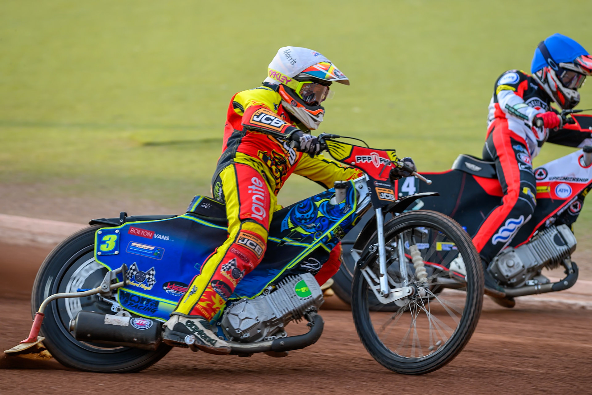 Nick Morris of Leicester Lions in White rides outside Zach Cook of Belle Vue Aces in Blue during the Rowe Motor Oil Premiership match between Belle Vue Aces and Leicester Lions at the National Speedway Stadium, Manchester on Monday 3rd August 2026. (Photo: Ian Charles | MI News)