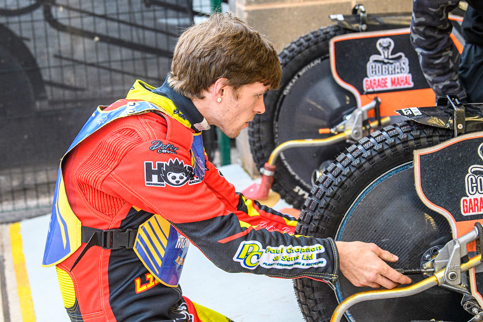 Connor Coles works on his bike during the National Development League match between Belle Vue Colts and Edinburgh Monarchs Academy at the National Speedway Stadium, Manchester on Friday 21st July 2023. (Photo: Ian Charles | MI News)