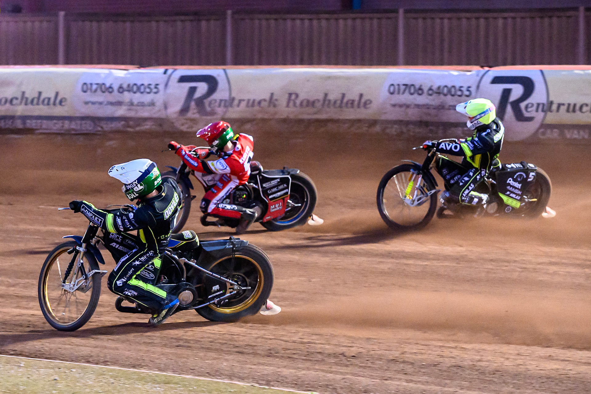 Jason Doyle of Ipswich Witches  in White rides inside Brady Kurtz of Belle Vue Aces  in Red with Emil Sayfutdinov of Ipswich Witches  in Yellow behind during the Rowe Motor Oil Premiership match between Belle Vue Aces and Ipswich Witches at the National Speedway Stadium, Manchester on Monday 4th August 2025. (Photo: Ian Charles | MI News)