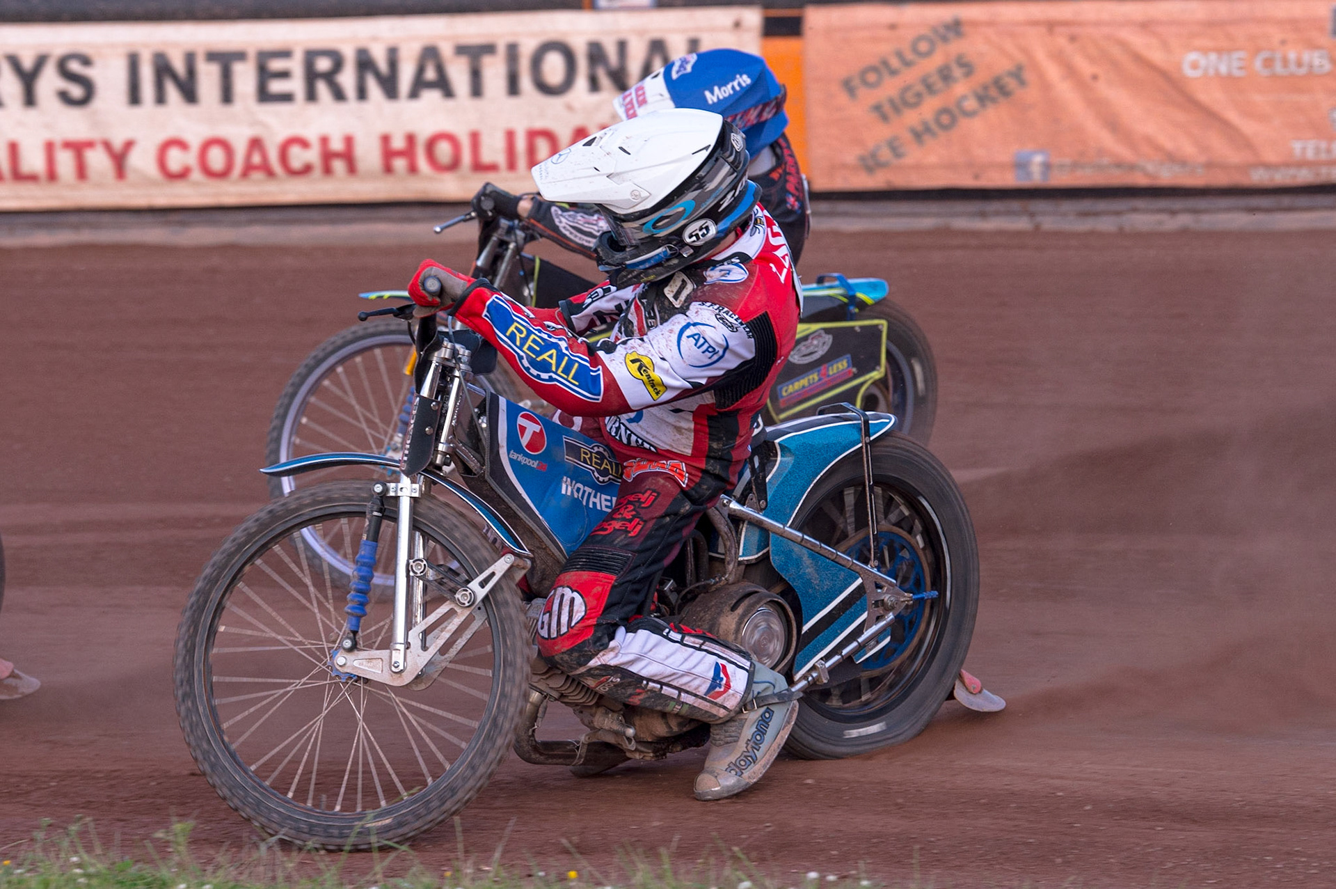 WOLVERHAMPTON, UK. JUN 20TH Matej Zagar   (White) inside Nick Morris  (Blue) during the SGB Premiership match between Wolverhampton Wolves and Belle Vue Aces at Monmore Green Stadium, Wolverhampton on Monday 20th June 2022. (Credit: Ian Charles | MI News)