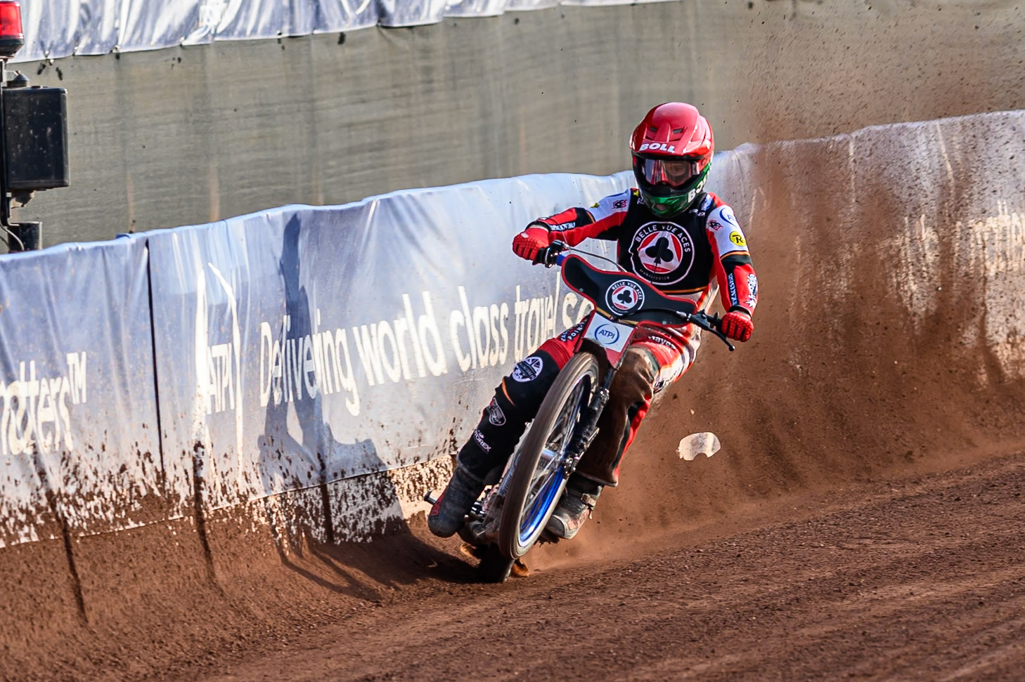 Belle Vue Aces' Brady Kurtz  picks up some drive from the dirt against the fence during the Rowe Motor Oil Premiership match between Belle Vue Aces and Ipswich Witches at the National Speedway Stadium, Manchester on Monday 30th June 2025. (Photo: Ian Charles | MI News)