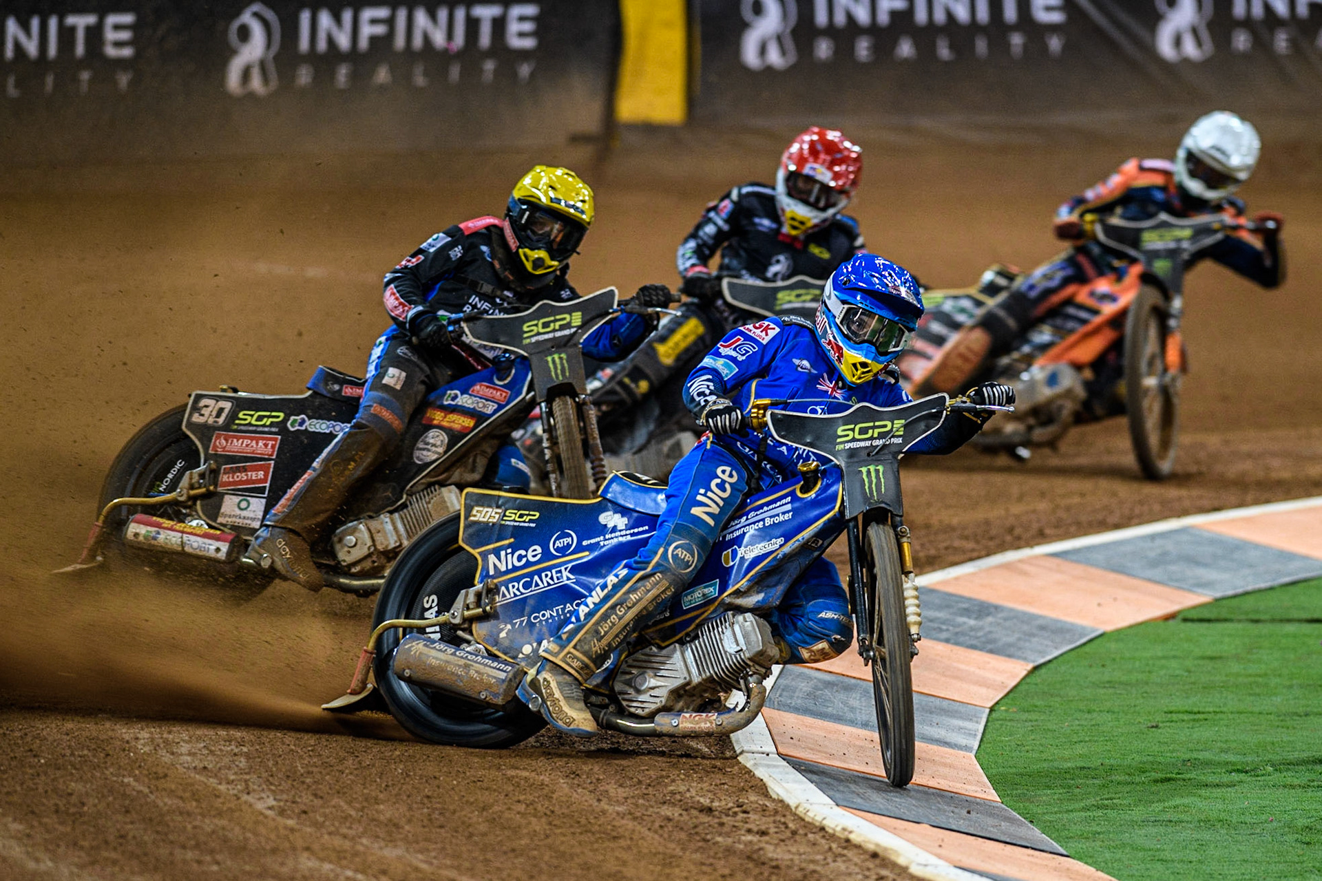 Robert Lambert (505) (Blue) leads Leon Madsen (30) (Yellow)  Maciej Janowski (71) (Red) and Mikkel Michelsen (155) (White) during the FIM Speedway Grand Prix of Great Britain at the Principality Stadium, Cardiff on Saturday 2nd September 2023. (Photo: Ian Charles | MI News)