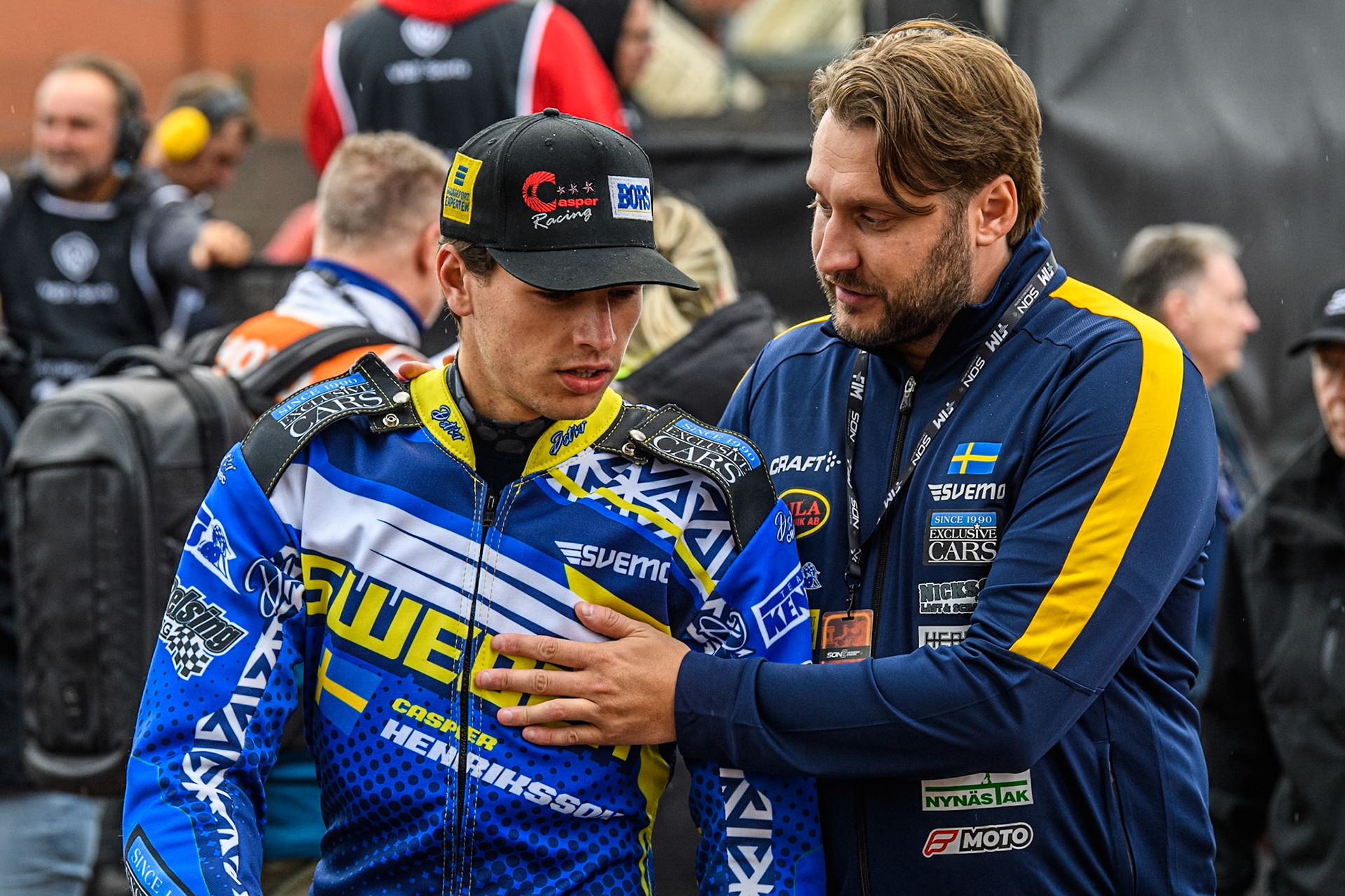 Casper Henriksson of Sweden (Left) with Swedish Team manager, Alexander Edberg during the Monster Energy FIM Speedway of Nations 2 (Under 21) Final at the National Speedway Stadium, Manchester on Friday 12th July 2024. (Photo: Ian Charles | MI News)