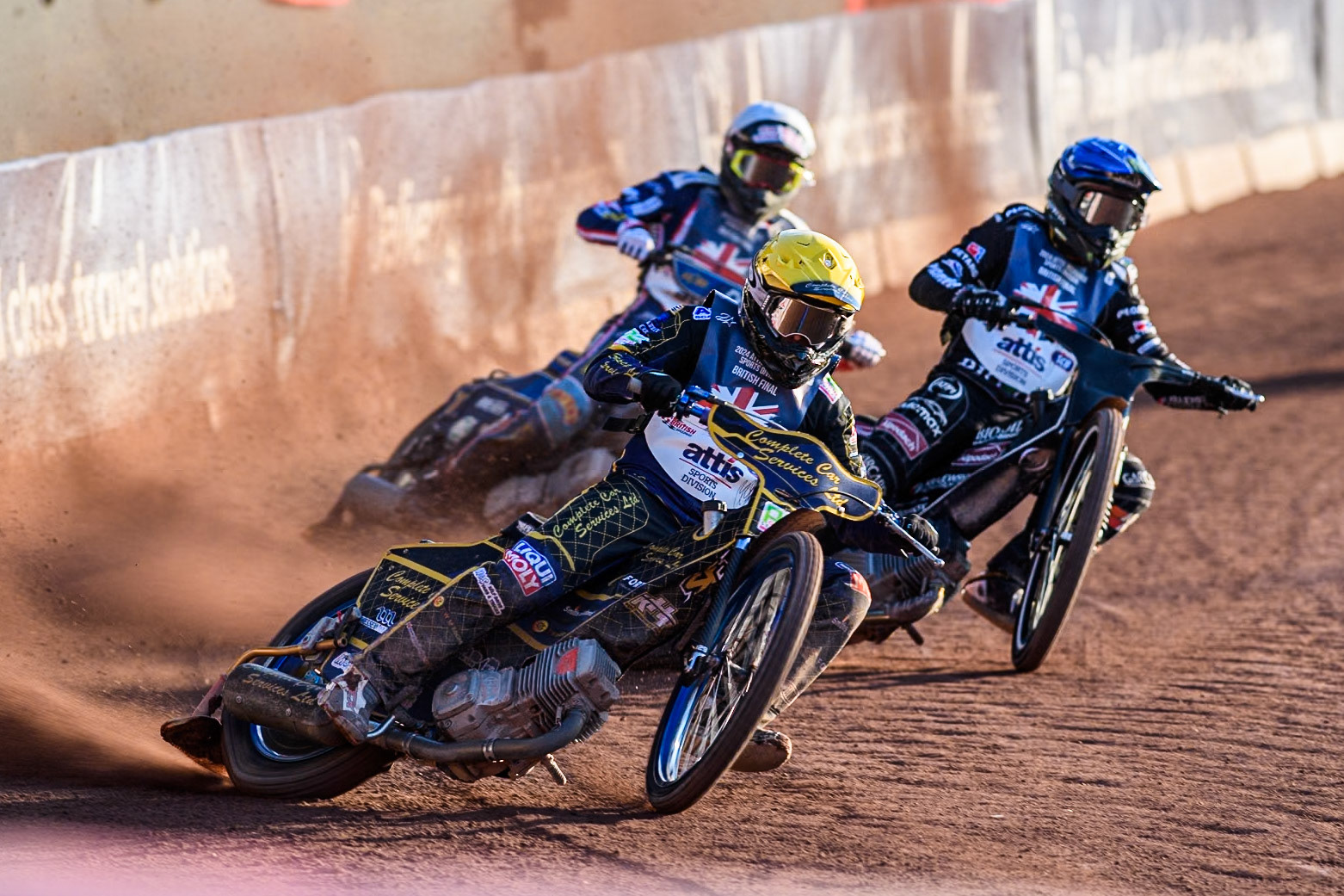 Kyle Howarth in Yellow leading Tai Woffinden in Blue and Anders Rowe in White during the Attis Insurance Sports Division British Speedway Championship Final at the National Speedway Stadium, Manchester on Saturday 8th June 2024. (Photo: Ian Charles | MI News)