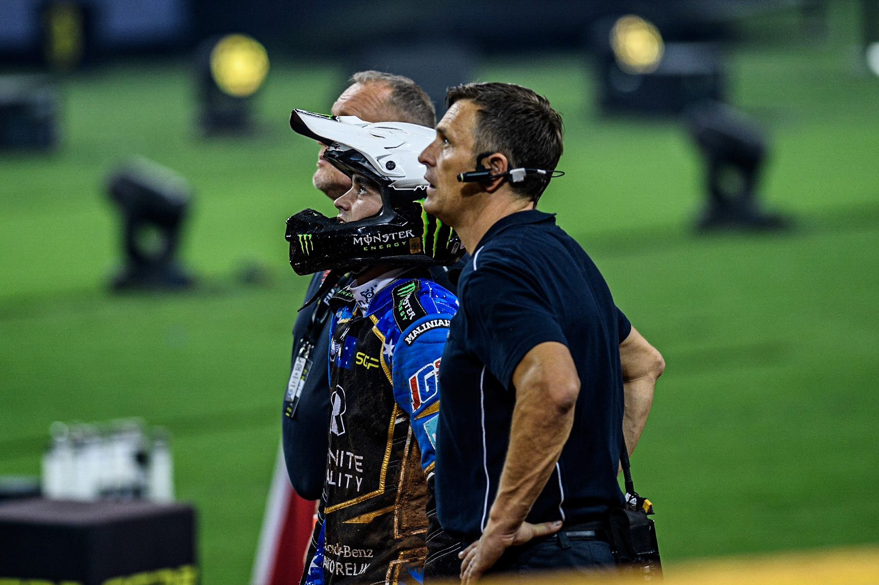 Jack Holder (25) (Centre) with SGP Race Director Phil Morris (Right) watch the replay of his fall on the stadium screens during the FIM Speedway Grand Prix of Great Britain at the Principality Stadium, Cardiff on Saturday 2nd September 2023. (Photo: Ian Charles | MI News)