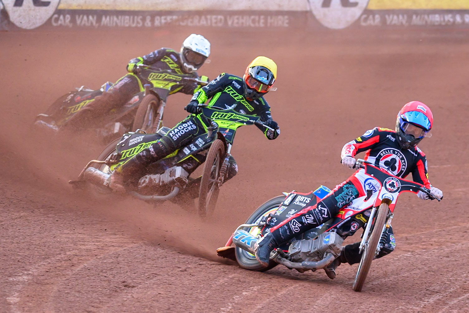 Tate Zischke of Belle Vue Aces  in Red leading Jason Edwards of Ipswich Witches  in Yellow and Philip Hellstrom-Bangs of Ipswich Witches  in White during the Rowe Motor Oil Premiership match between Belle Vue Aces and Ipswich Witches at the National Speedway Stadium, Manchester on Monday 20th April 2026. (Photo: Ian Charles | MI News)