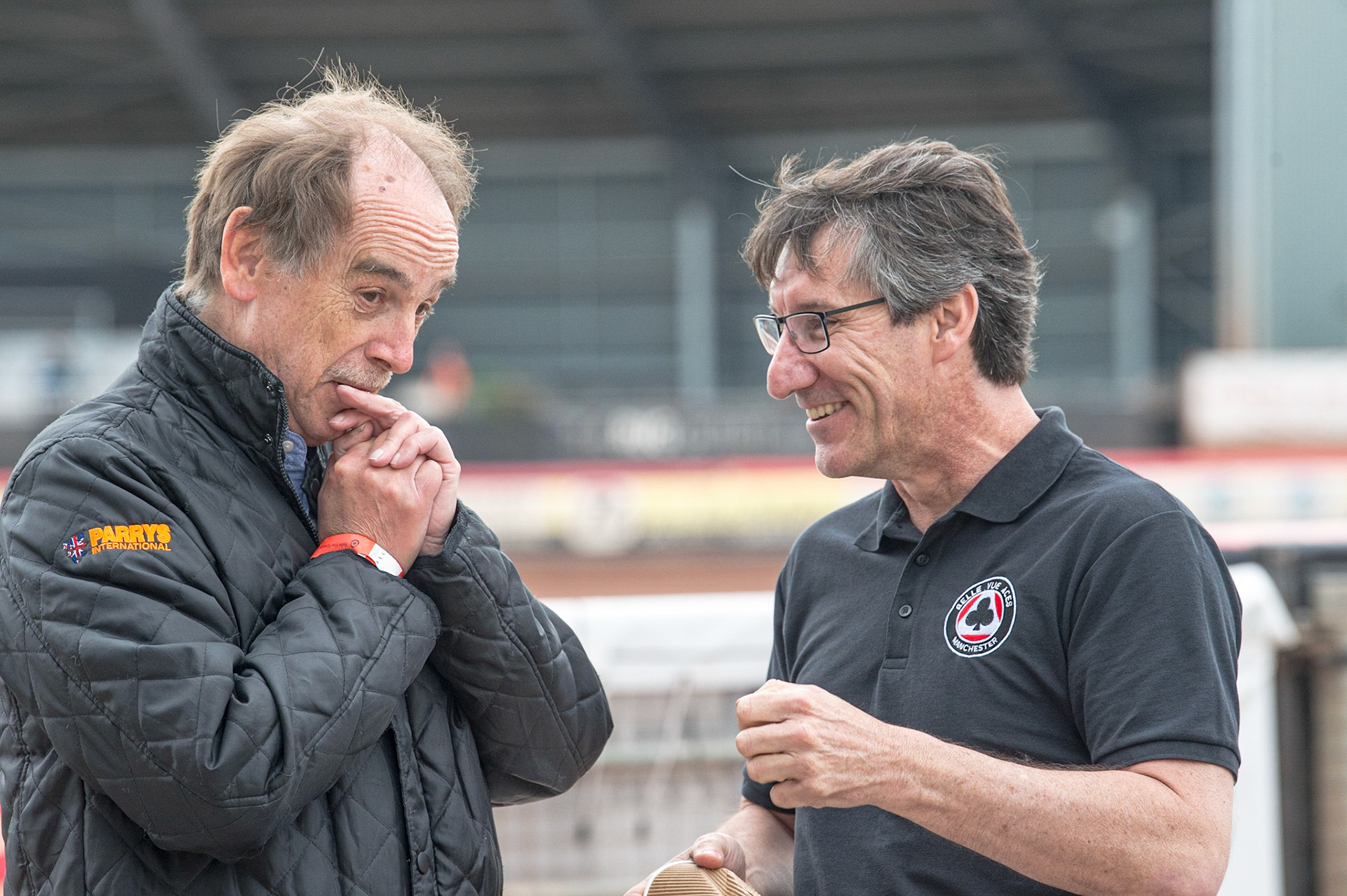 MANCHESTER, UK. JUN 13TH Wolverhampton Speedway Promoter Chris Van Straaten (left) chats with Belle Vue ATPI Aces Team manager Mark Lemon during the SGB Premiership match between Belle Vue Aces and Wolverhampton  Wolves at the National Speedway Stadium, Manchester on Monday 13th June 2022. (Credit: Ian Charles | MI News)