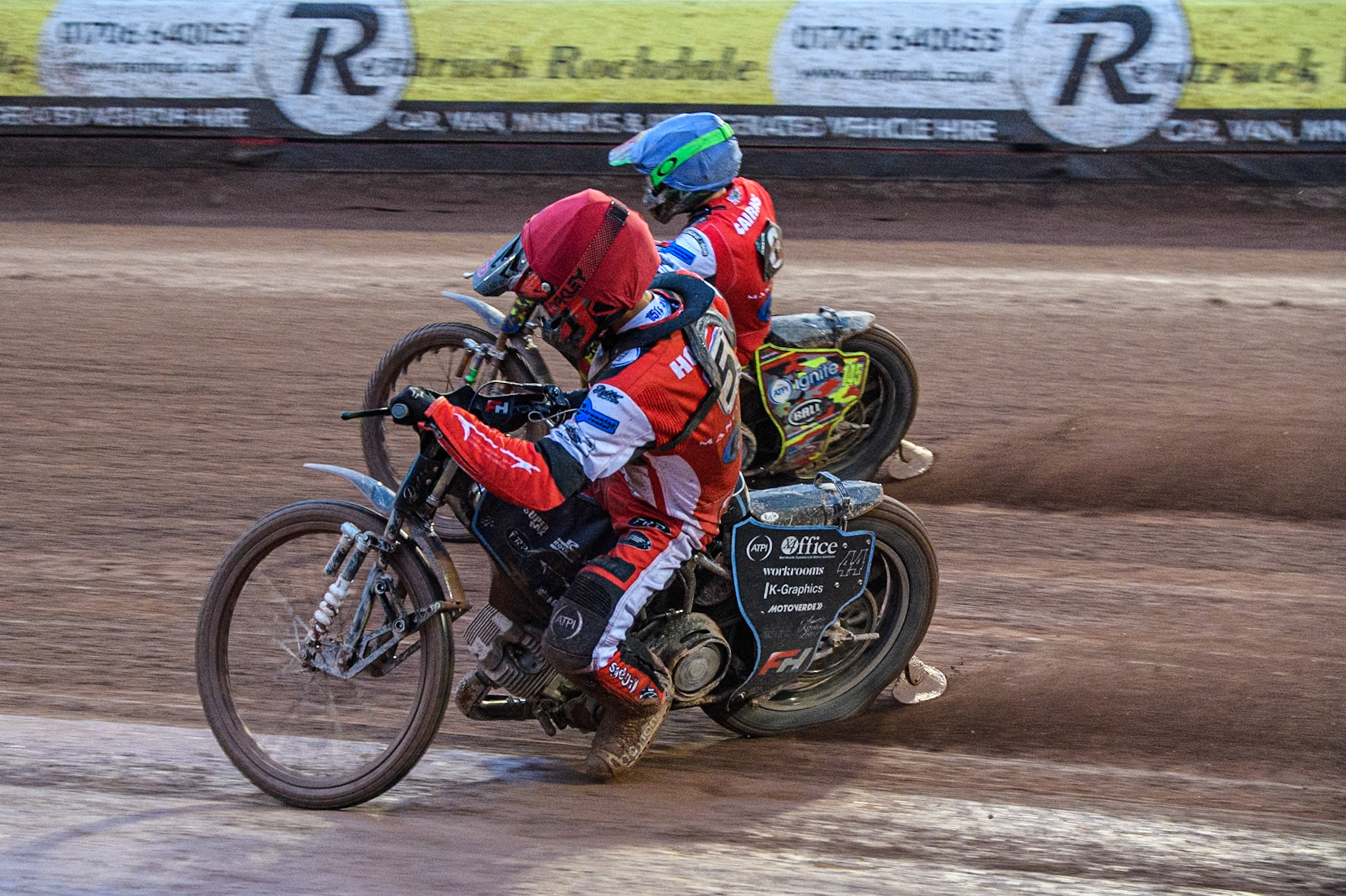 Belle Vue Colts' Freddy Hodder  in Red rides inside Belle Vue Colts' William Cairns  in Blue during the WSRA National Development League match between Belle Vue Colts and Oxford Chargers at the National Speedway Stadium, Manchester on Friday 2nd August 2024. (Photo: Ian Charles | MI News)