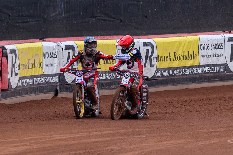 Norick Blödorn of Belle Vue Aces in Blue and Brady Kurtz of Belle Vue Aces in Red celebrate their maximum heat win during the Rowe Motor Oil Premiership match between Belle Vue Aces and Northampton Foxes at the National Speedway Stadium, Manchester on Monday 4th May 2026. (Photo: Ian Charles | MI News)