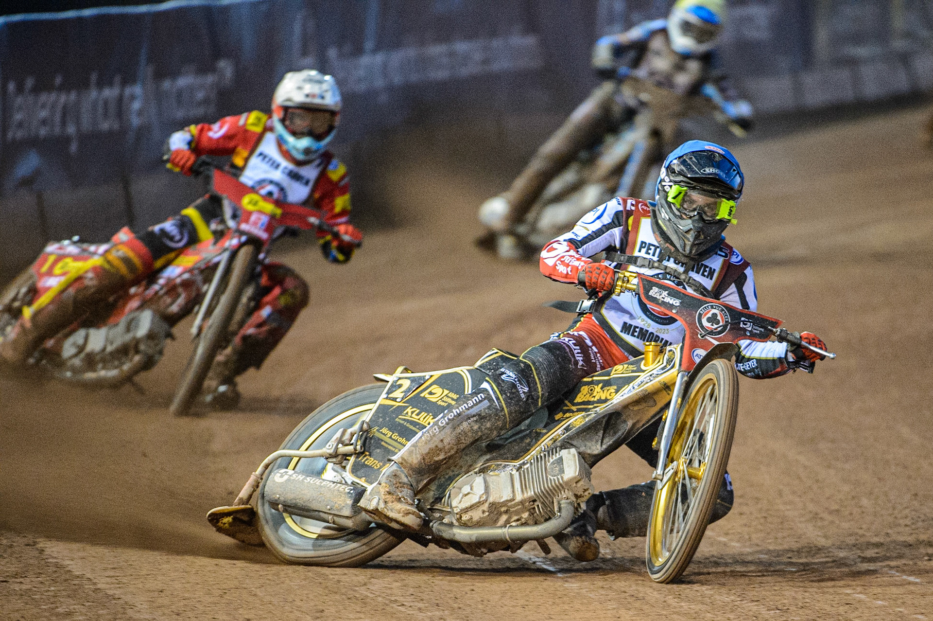 Norick Blodorn  (Blue) leads Max Fricke  (White)and Justin Sedgmen  (Yellow)  during the Peter Craven Memorial Trophy  at the National Speedway Stadium, Manchester on Monday 3rd April 2023. (Photo: Ian Charles | MI News)