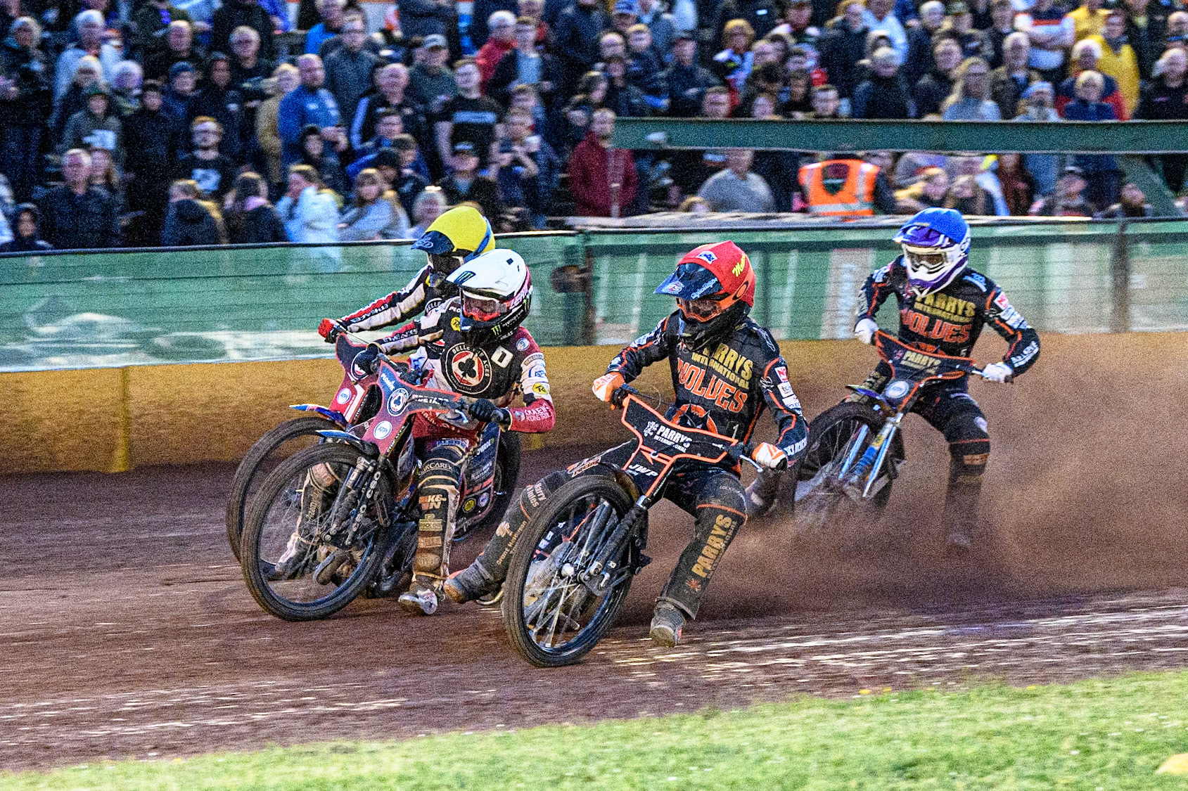 Sam Masters (Red) inside Dan Bewley (White) and Brady Kurtz (Yellow) with Rory Schlein (Blue) behind during the Sports Insure Premiership match between Wolverhampton Wolves and Belle Vue Aces at Monmore Green Stadium, Wolverhampton on Monday 29th May 2023. (Photo: Ian Charles | MI News)