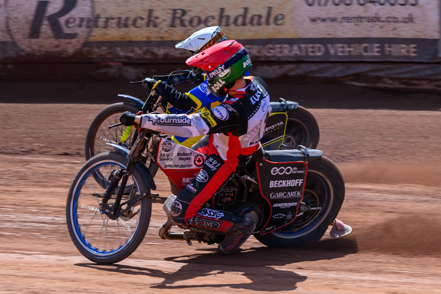 Brady Kurtz of Belle Vue Aces in Red rides inside Chris Holder of Sheffield Tigers in White during the Rowe Motor Oil Premiership match between Belle Vue Aces and Sheffield Tigers at the National Speedway Stadium, Manchester on Monday 25th May 2026. (Photo: Ian Charles | MI News)
