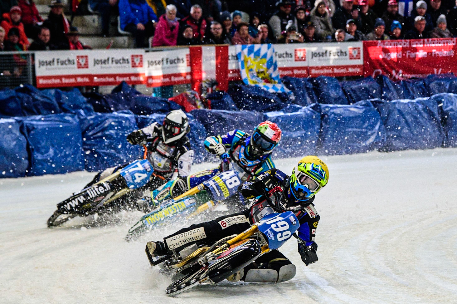 Martin Haarahiltunen (199) (Yellow) leads Luca Bauer (48) (Red) and Mats Järf (74) (White)  during the Ice Speedway Gladiators World Championship Final 2 at Max-Aicher-Arena, Inzell, Germany on Sunday 19th March 2023. (Photo: Ian Charles | MI News)