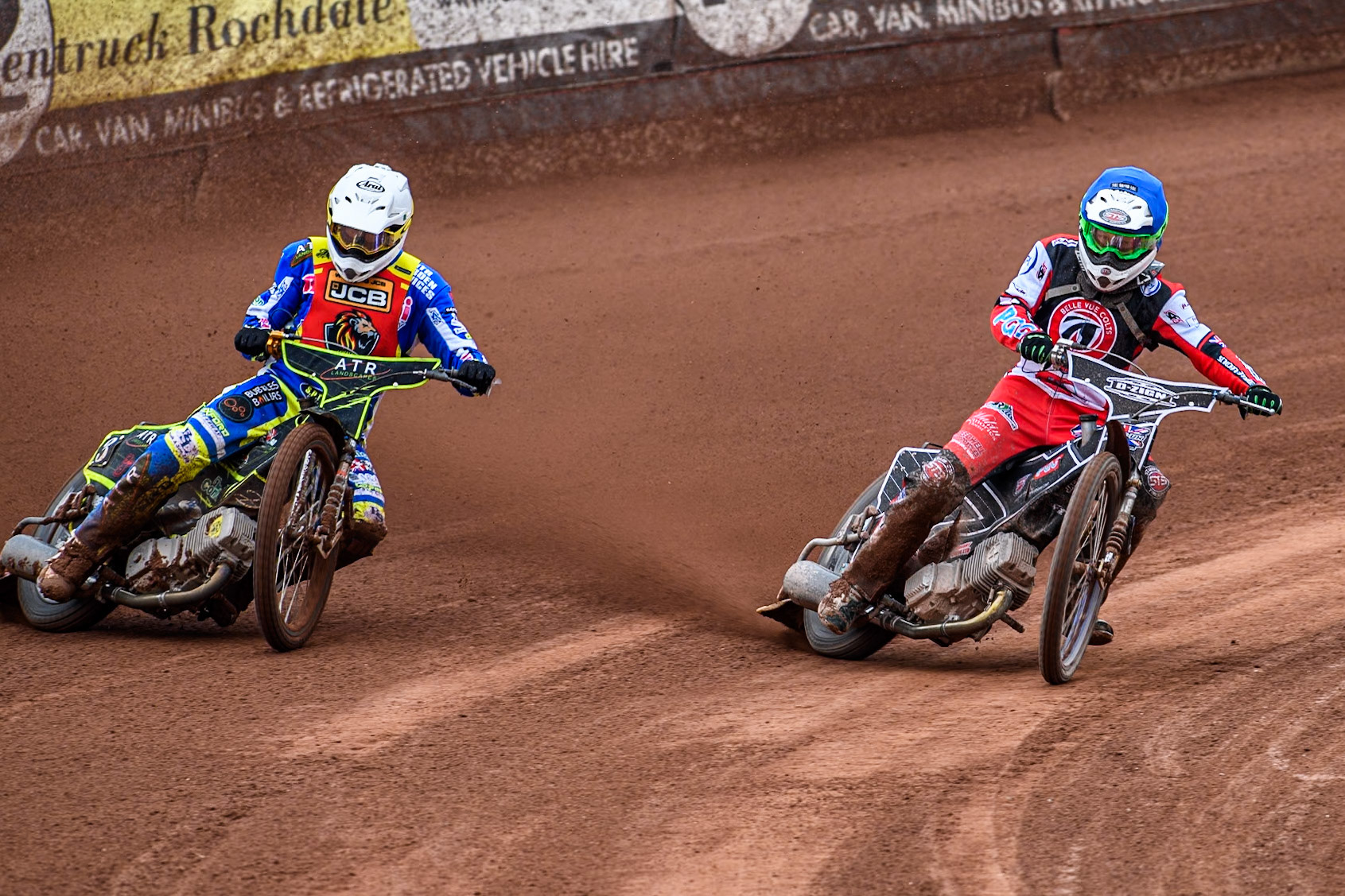 Belle Vue Colts' Jack Shimelt  in Blue rides inside Leicester Lion Cubs' Guest Rider Darryl Ritchings in White during the WSRA National Development League match between Belle Vue Colts and Leicester Lion Cubs at the National Speedway Stadium, Manchester on Friday 18th April 2025. (Photo: Ian Charles | MI News)