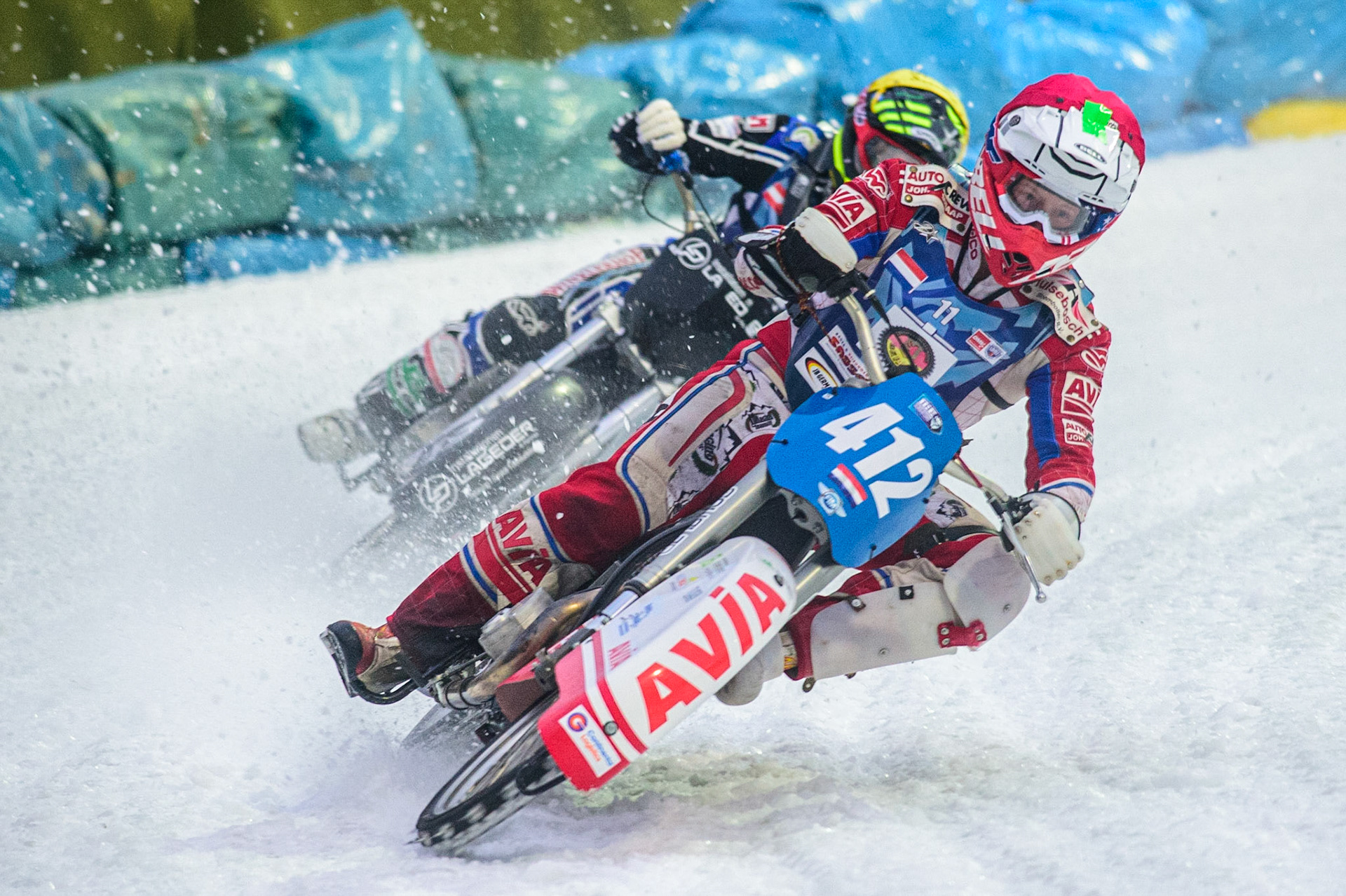 Niek Schaap (Red) leads Philipp Lageder (Yellow) during the German Individual Ice Speedway Championship at Horst-Dohm-Eisstadion, Berlin on Friday 3rd March 2023. (Photo: Ian Charles | MI News)