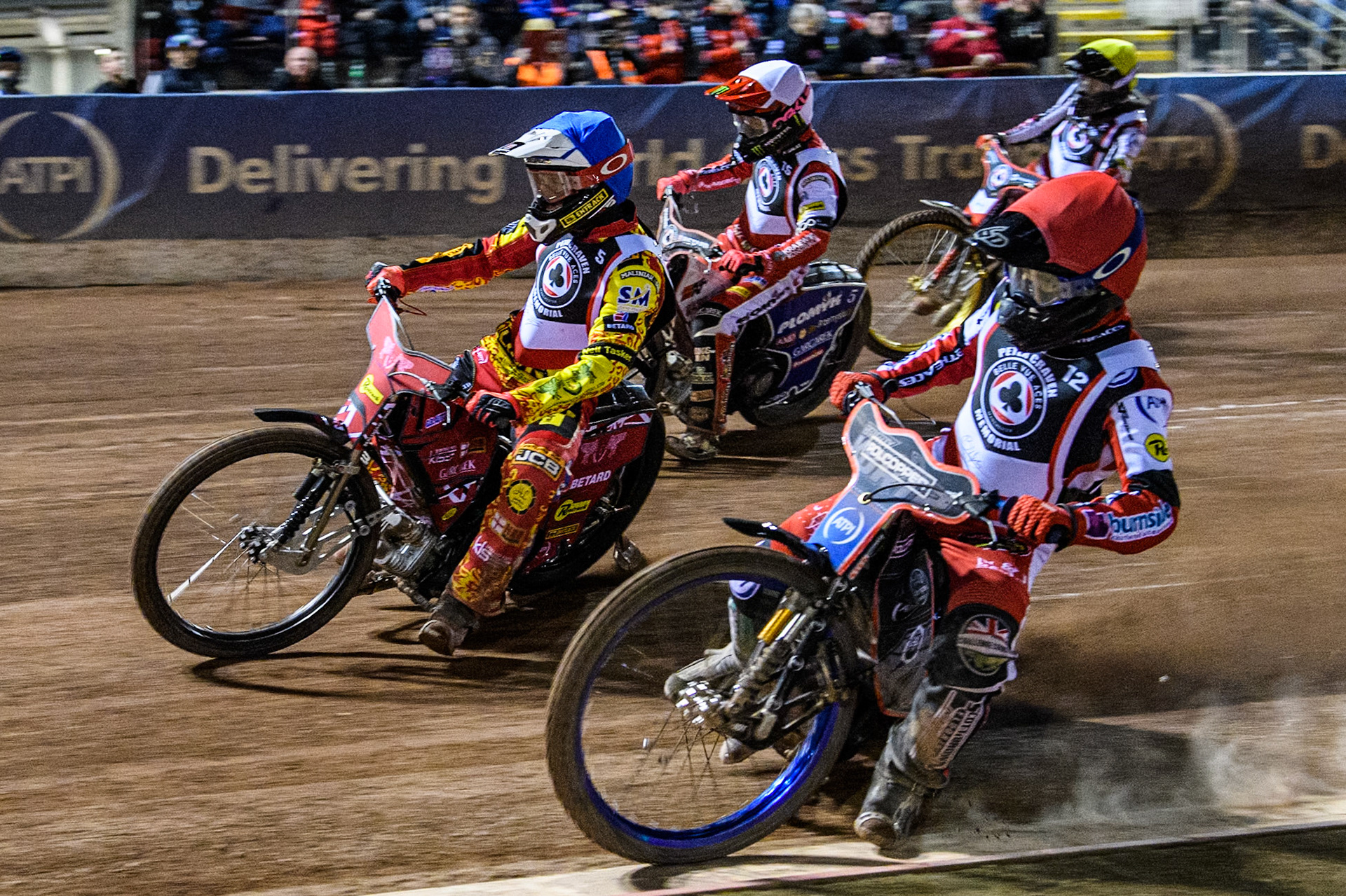 Australia's Brady Kurtz (Red) inside Australia's Max Fricke (Blue) England's Dan Bewley (White) and Germany's Norick Blödorn (Yellow) during the Peter Craven Memorial Trophy meeting at the National Speedway Stadium, Manchester on Monday 18th March 2024. (Photo: Ian Charles | MI News)