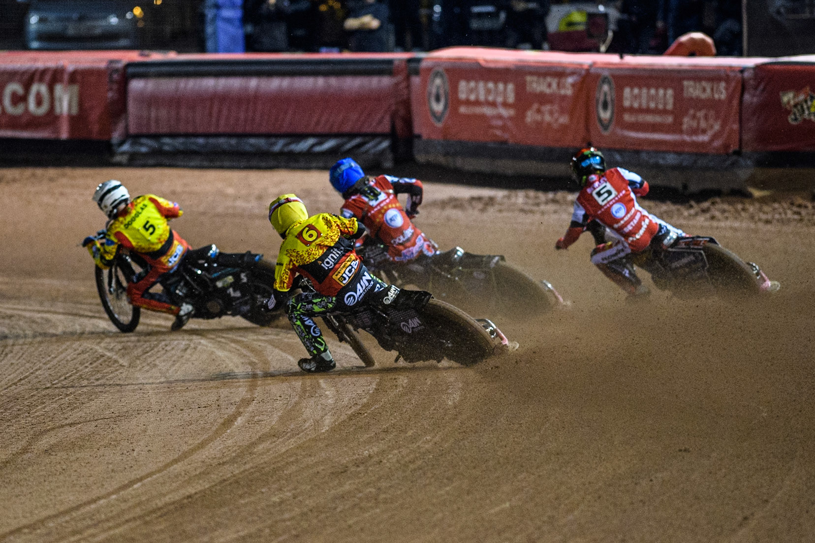 Leicester Lions' Guest Rider Lewis Kerr  chases Leicester Lions' Ryan Douglas, Belle Vue Aces' Jake Mulford  in Blue and Belle Vue Aces' Dan Bewley  in Red during the Rowe Motor Oil Premiership Grand Final 1st Leg between Belle Vue Aces and Leicester Lions at the National Speedway Stadium, Manchester on Monday 23rd September 2024. (Photo: Ian Charles | MI News)