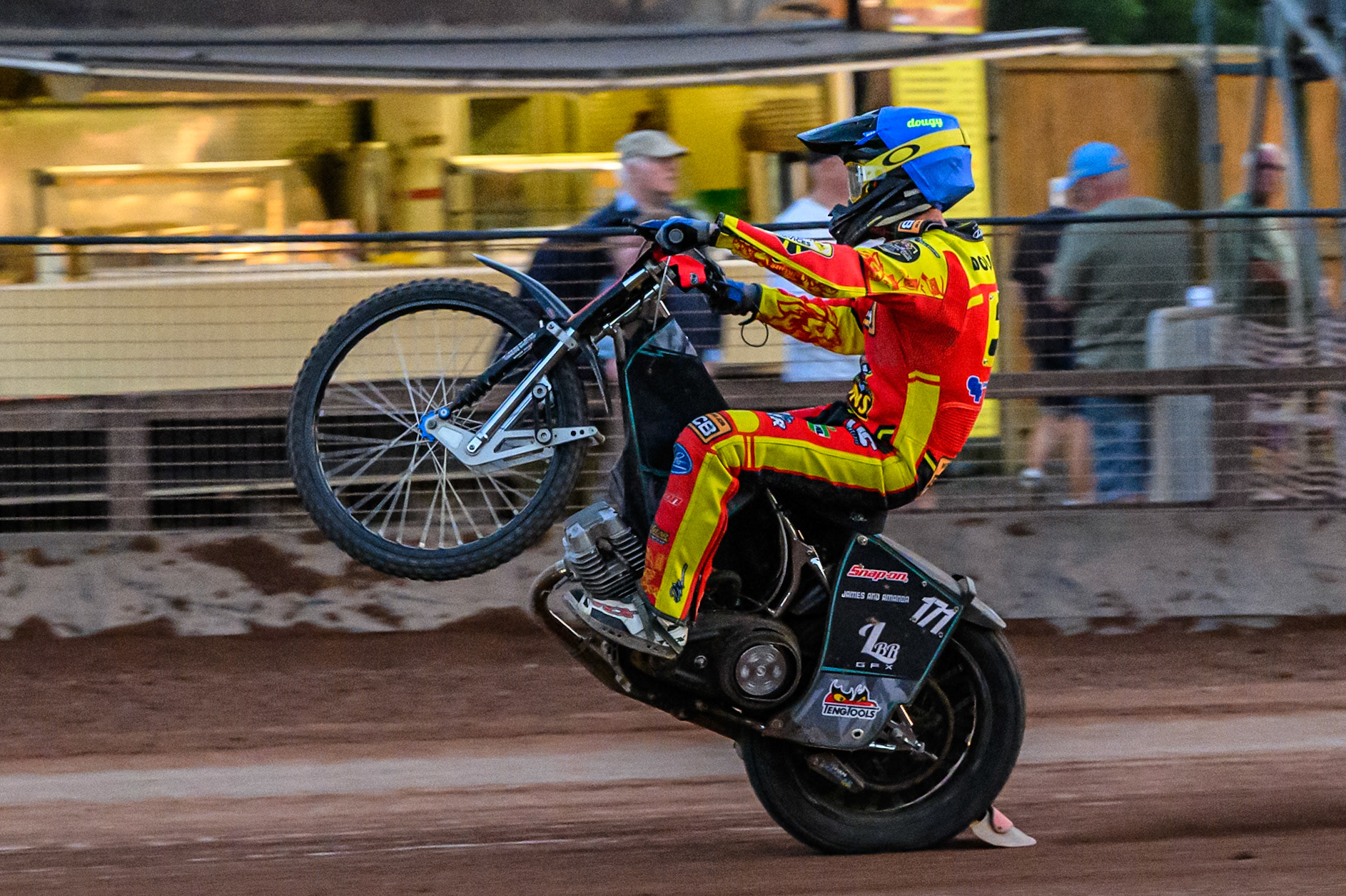 Leicester Lions' Kyle Howarth celebrates with a wheelie during the Rowe Motor Oil Premiership match between Leicester Lions and Belle Vue Aces at the Hydroscand Arena, Leicester on Thursday 19th June 2025. (Photo: Ian Charles | MI News)