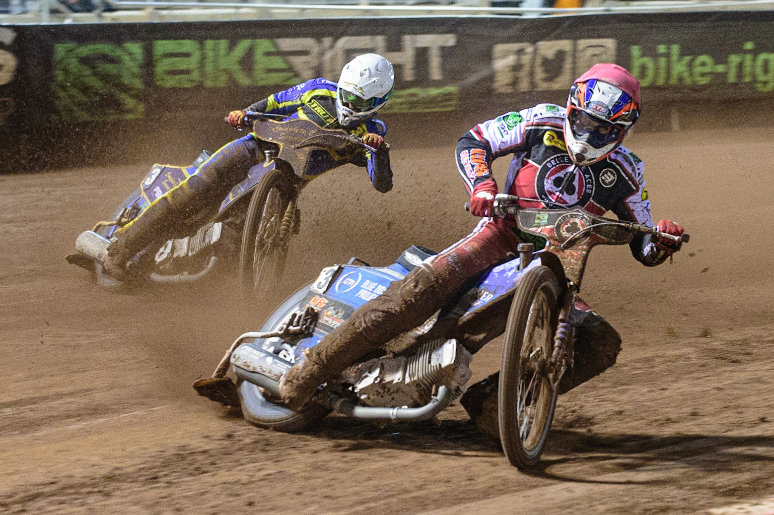 MANCHESTER, UK. OCT 7TH  Steve Worrall   (Red) leads Kyle Howarth  (White) during the SGB Premiership Play off Semi-Final Second Leg between Belle Vue Aces and Sheffield Tigers at the National Speedway Stadium, Manchester on Thursday 7th October 2021. (Credit: Ian Charles | MI News)