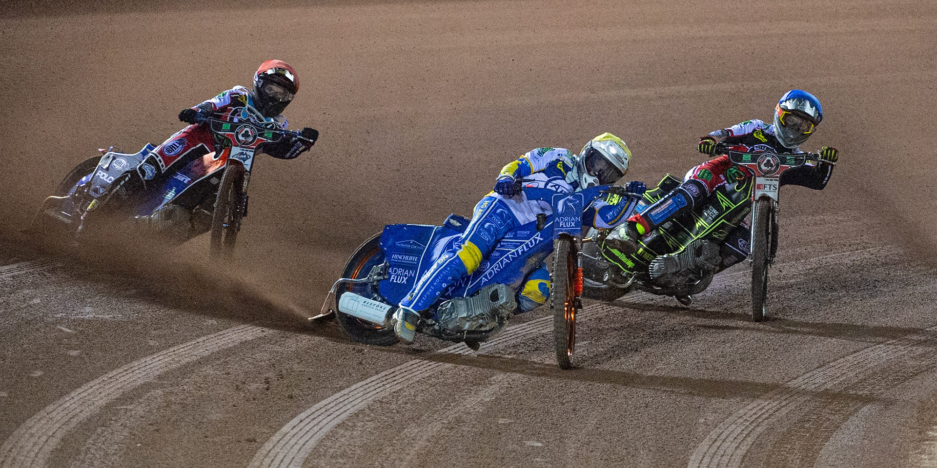 Photo: Ian CharlesLewis Kerr of the 'ATPI' All Stars (Yellow) takes the lead from Brady Kurtz of Belle Vue 'BikeRight' Aces (Red) and Jye Etheridge of Belle Vue 'BikeRight' Aces  (Blue)Belle Vue ‘Bikerite ’Aces v ‘ATPI’ All Stars, Premiership Challenge, National Speedway Stadium, Manchester Thursday  24  September  2020