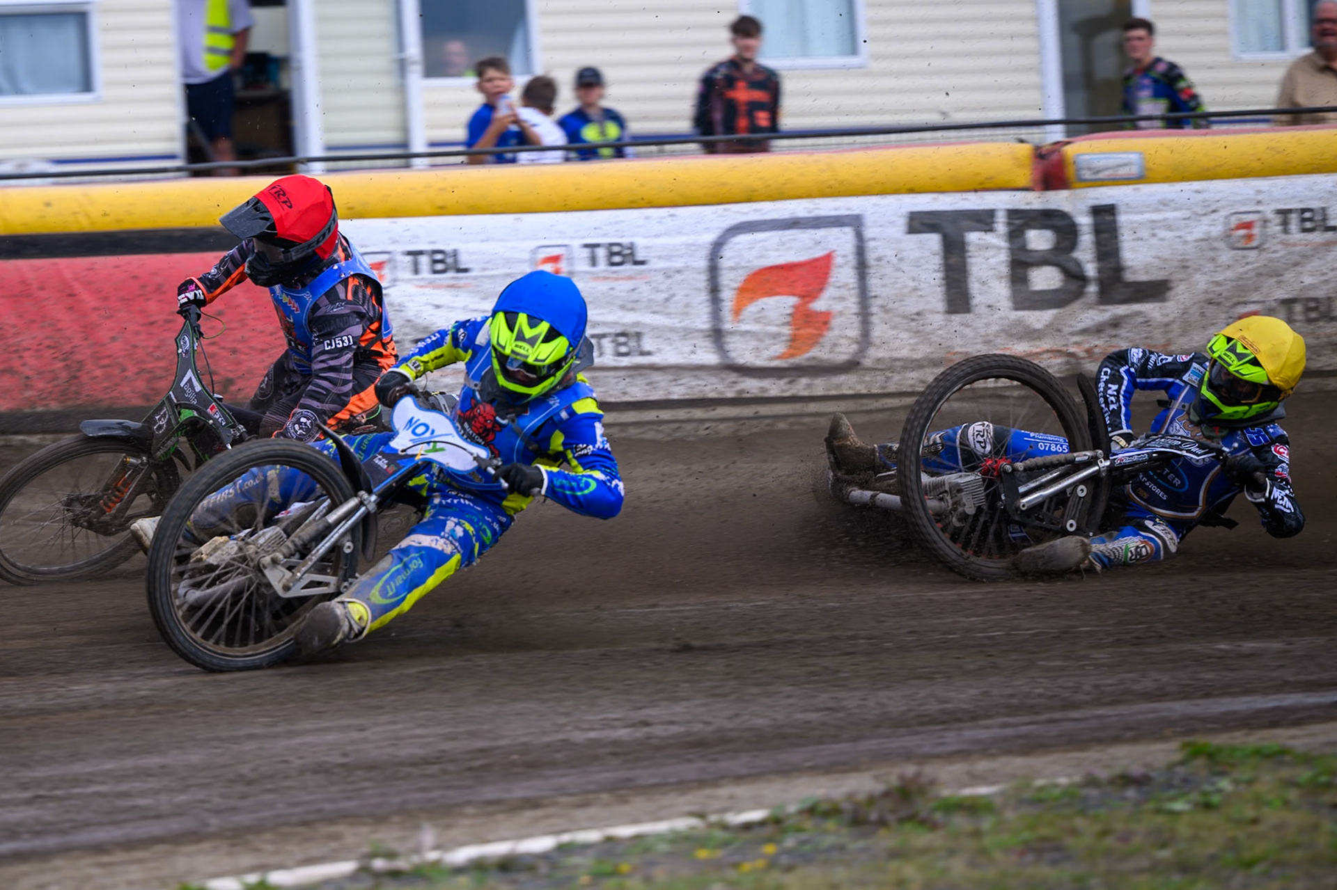 Will Boraston of Buxton Bulls in Yellow falls in the path of Ollie Binns of Kings Lynn Young Stars during the WSRA National Development League match between Buxton Bulls and King's Lynn Young Stars at Hi-Edge Speedway, Buxton on Sunday 9th August 2026. (Photo: Ian Charles | MI News)