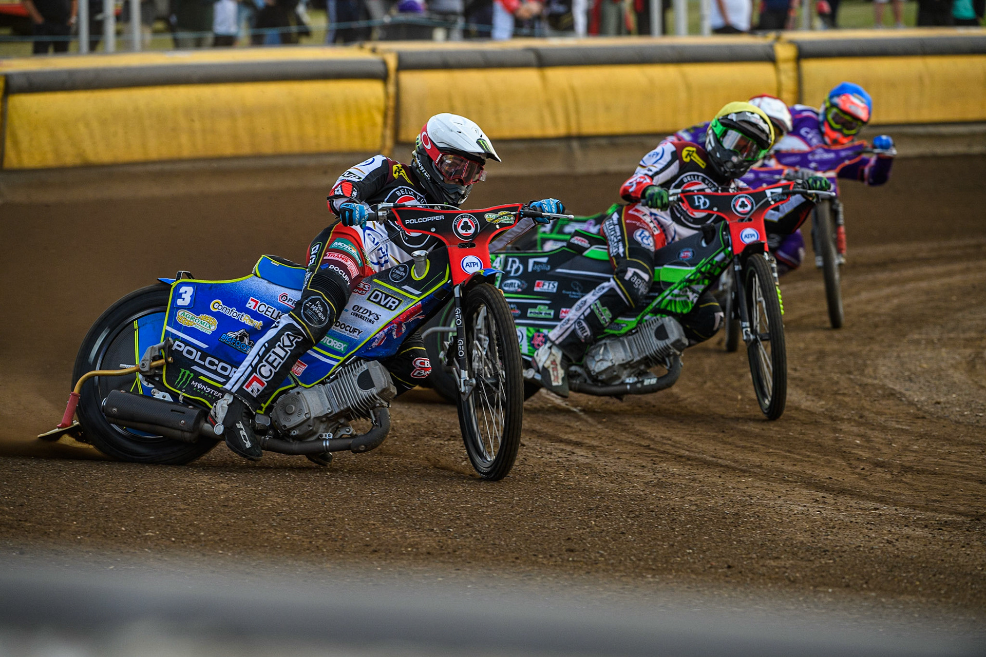 Jaimon Lidsey (White) and Charles Wright (Yellow) go for maximum points over Benjamin Basso (Red) and Richie Worrall (Blue) during the Sports Insure Premiership match between Peterborough and Belle Vue Aces at East of England Showground, Peterborough on Monday 26th June 2023. (Photo: Ian Charles | MI News)