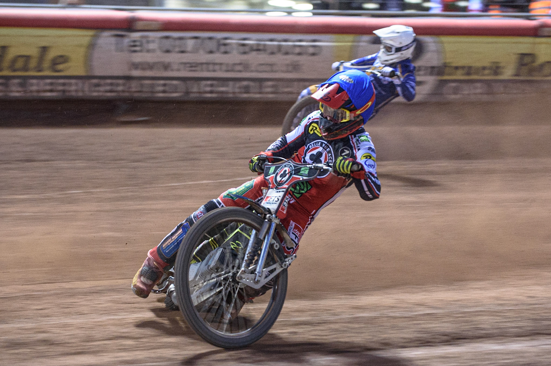 MANCHESTER, UK. AUGUST 23RD    Jye Etheridge  (Blue) leads Erik Riss  (White) during the SGB Premiership match between Belle Vue Aces and King's Lynn Stars at the National Speedway Stadium, Manchester on Monday 23rd August 2021. (Credit: Ian Charles | MI News)