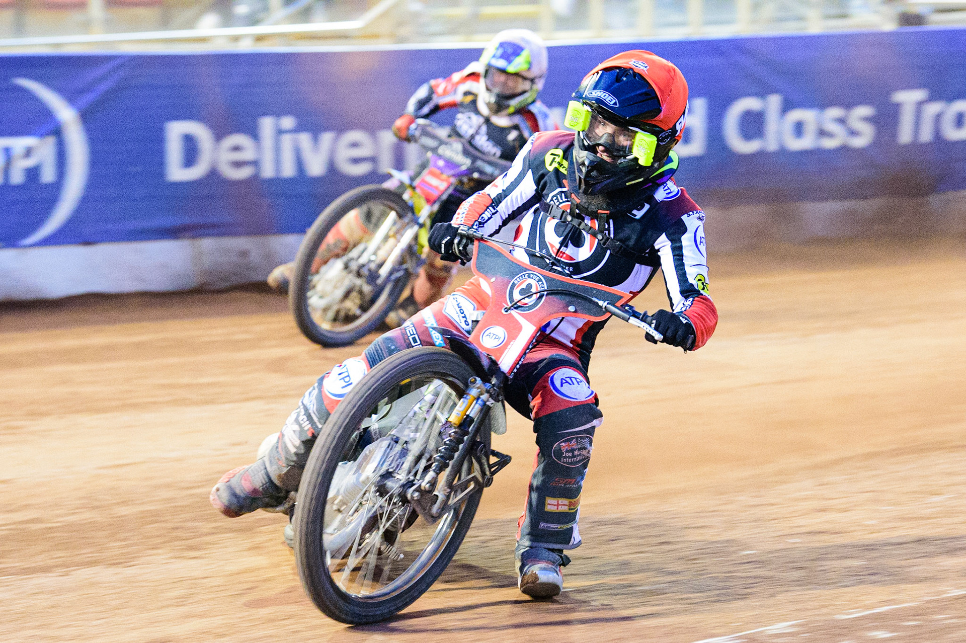 Tom Brennan (Red) leads Chris Harris  (White) during the SGB Premiership match between Belle Vue Aces and Peterborough at the National Speedway Stadium, Manchester on Monday 25th July 2022. (Credit: Ian Charles | MI News