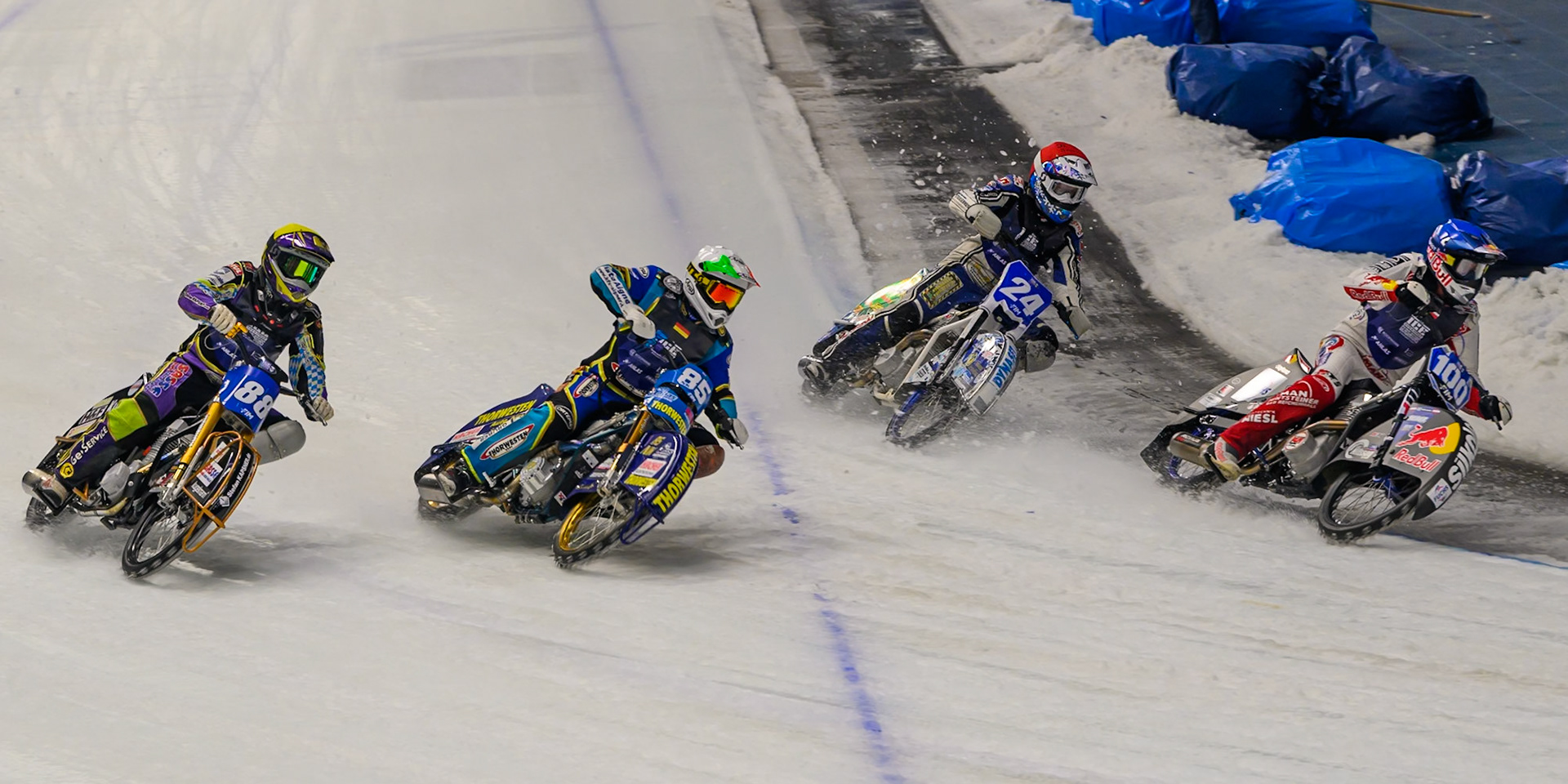 Last Chance Heat: Franz Zorn (100) of Austria in Blue leading Max Koivula (24) of Finland in Red, Luca Bauer (85) of Italy/Germany  in White and Max Niedermaier (88) of Germany in Yellow during the Ice Speedway Gladiators World Championship Final 2 at Max-Aicher-Arena, Inzell on Sunday 15th March 2026. (Photo: Ian Charles | MI News)