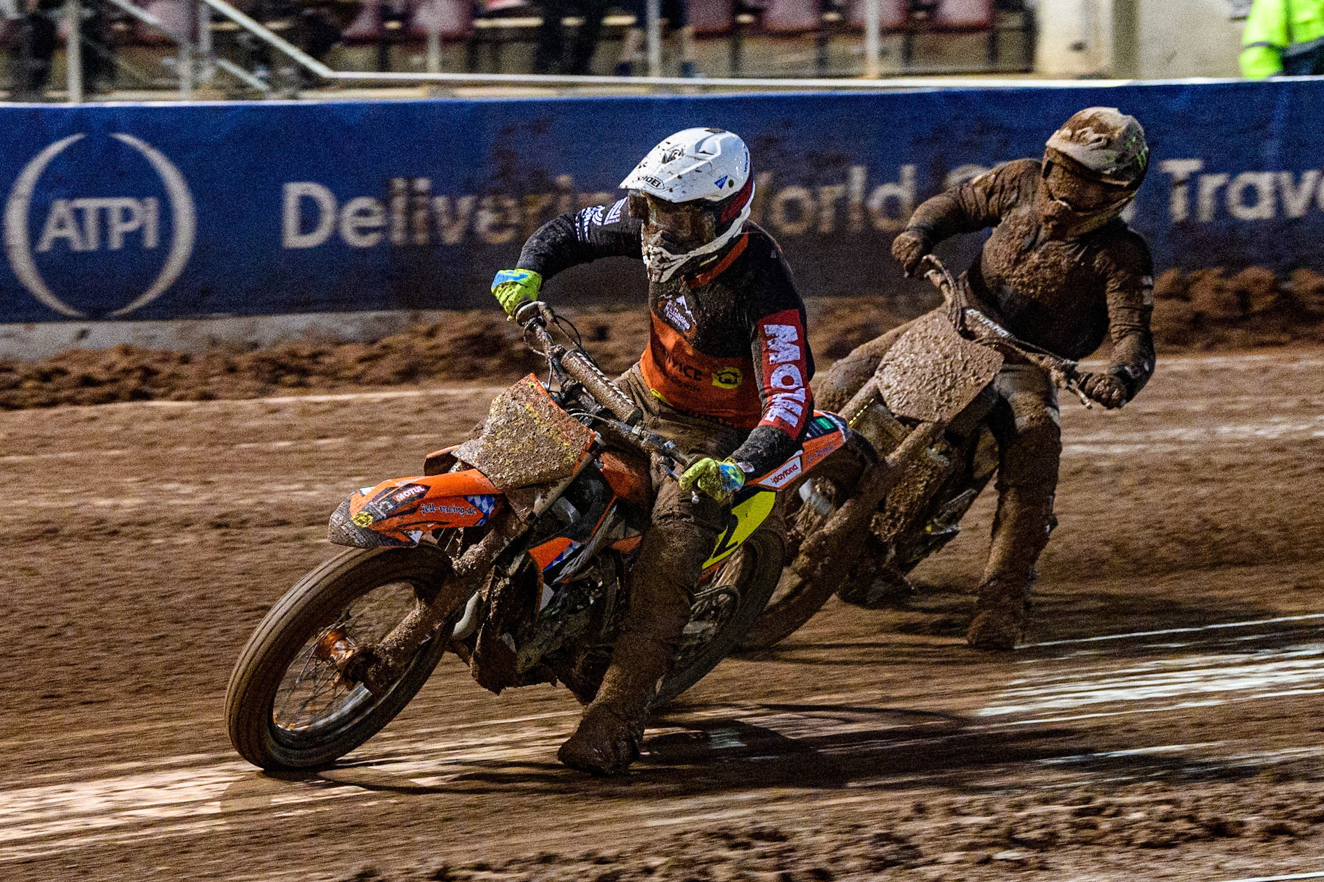 Markus Jell (82) from Germany leads a back marker in the Grand Final during the FIM World Flat Track Championship Round 1 at the National Speedway Stadium, Manchester on Saturday 5th August 2023. (Photo: Ian Charles | MI News)