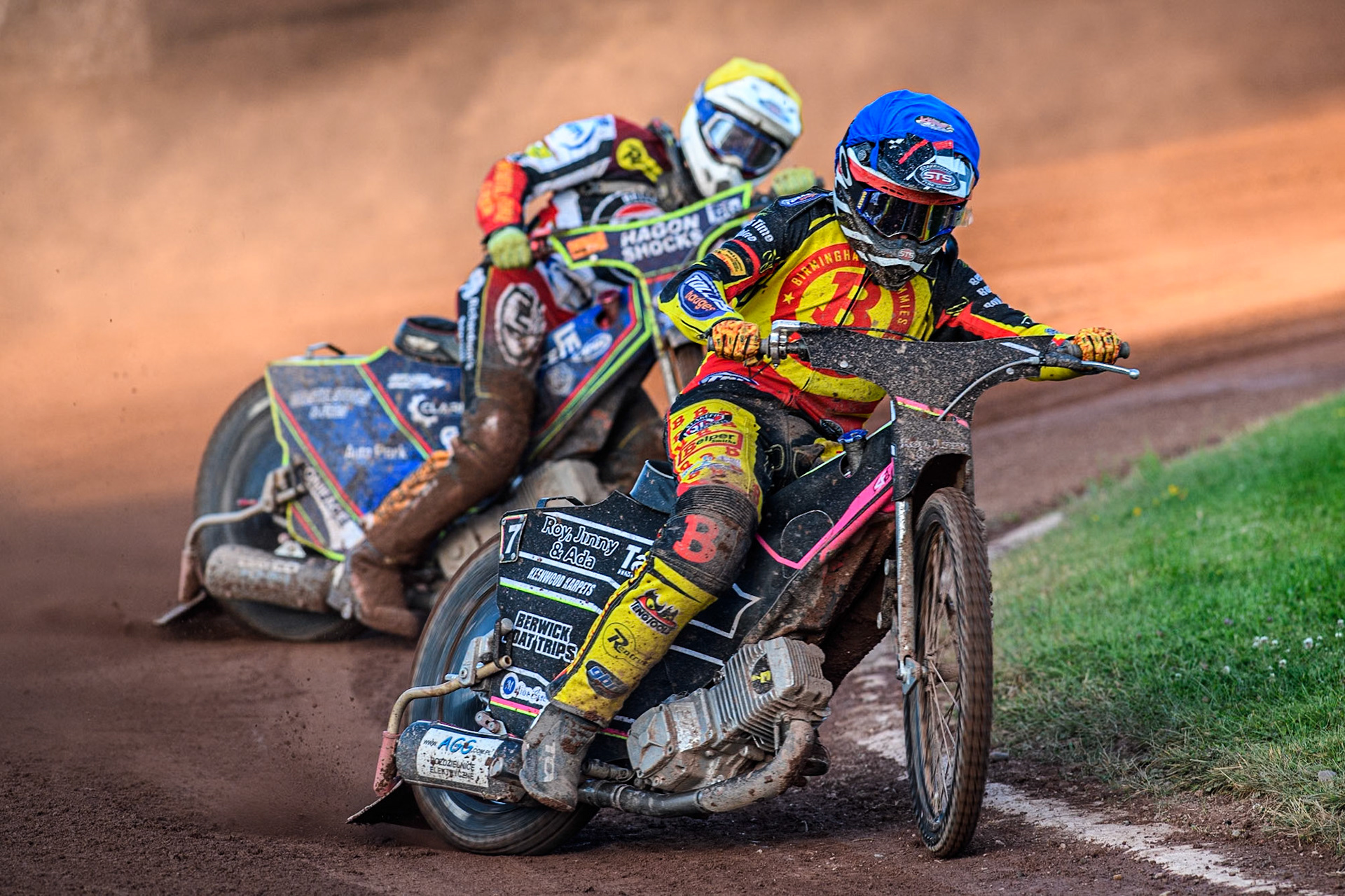 Birmingham Brummies' Leon Flint in Blue leading Belle Vue Aces' Jake Mulford in Yellow during the Rowe Motor Oil Premiership match between Birmingham Brummies and Belle Vue Aces at Perry Bar Stadium, Birmingham on Monday 29th July 2024. (Photo: Ian Charles | MI News)