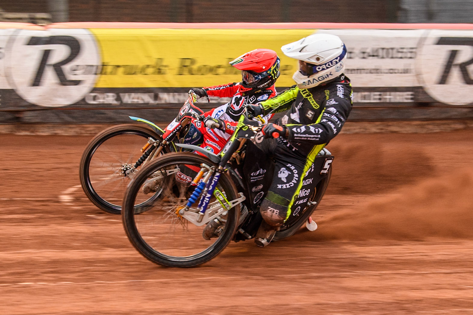 Ipswich Witches' Emil Sayfutdinov in White rides inside Belle Vue Aces' Jaimon Lidsey  in Red during the Rowe Motor Oil Premiership match between Belle Vue Aces and Ipswich Witches at the National Speedway Stadium, Manchester on Monday 1st July 2024. (Photo: Ian Charles | MI News)