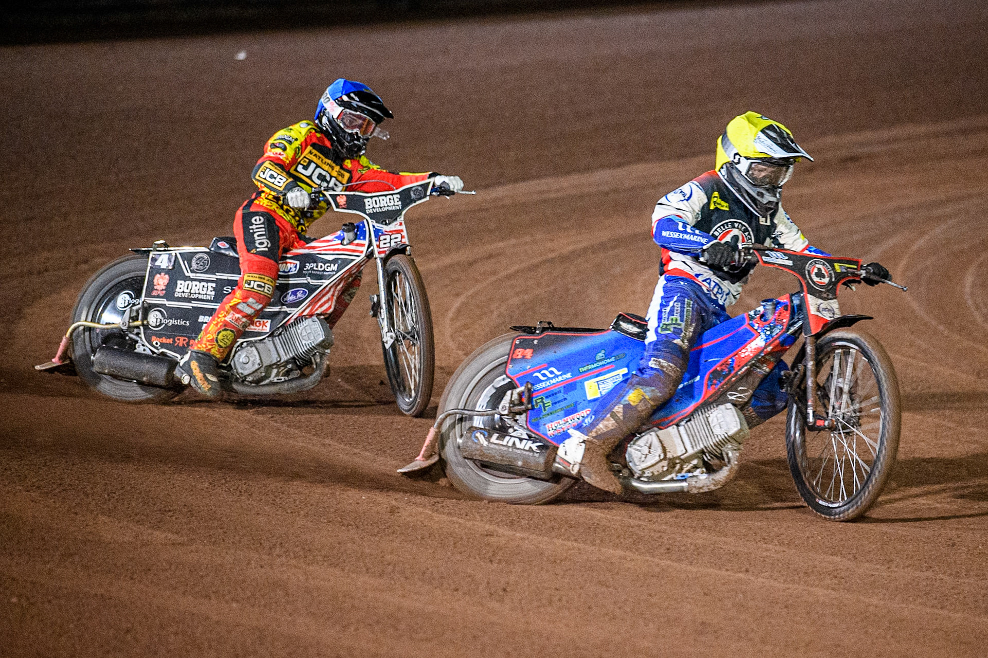 Belle Vue Aces' Ben Cook in Blue leading Leicester Lions' Luke Becker in Blue during the Rowe Motor Oil Premiership Grand Final 2nd Leg between Leicester Lions and Belle Vue Aces at the Pidcock Motorcycles Arena, Leicester on Thursday 26th September 2024. (Photo: Ian Charles | MI News)