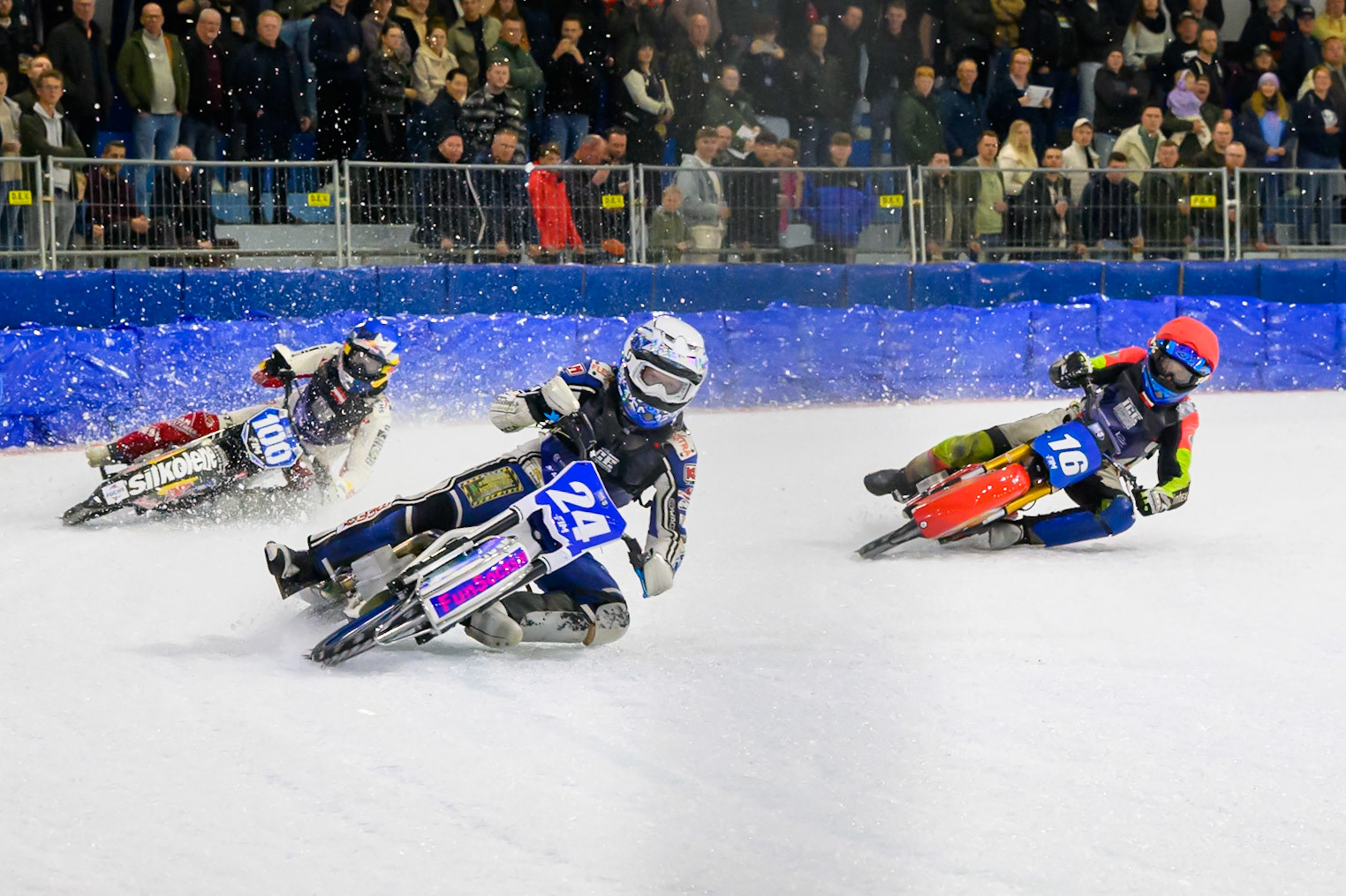 Max Koivula (24) of Finland in White leading Franz Zorn (100) of Austria in Blue and Wild Card Harald Simon (16) of Austria  in Red during the FIM Ice Speedway Gladiators World Championship Final 3 at Ice Rink Thialf, Heerenveen on Saturday 11th April 2026. (Photo: Ian Charles | MI News)
