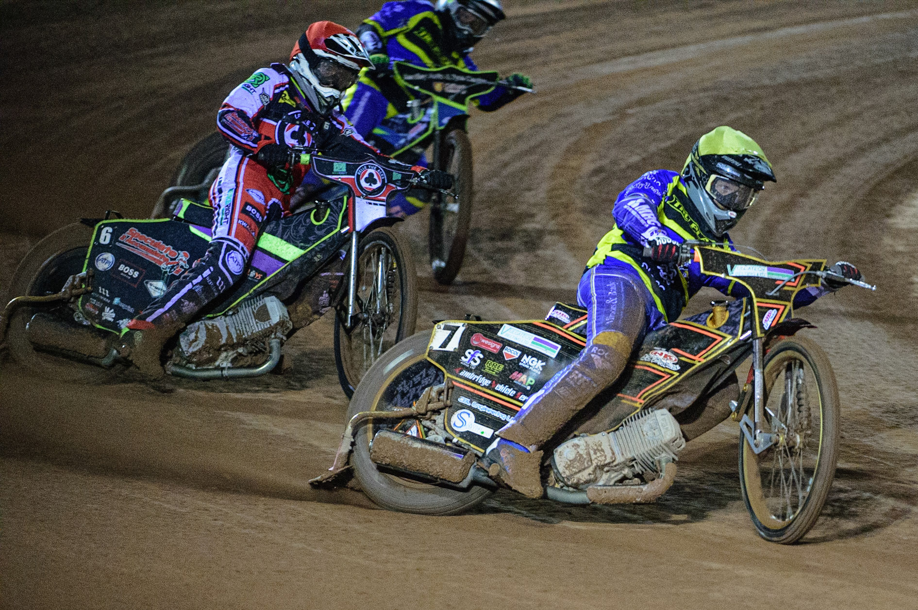 MANCHESTER, UK. OCT 7TH  Connor Mountain  (Yellow) leads Tom Brennan  (Red) and Danyon Hume  (White) during the SGB Premiership Play off Semi-Final Second Leg between Belle Vue Aces and Sheffield Tigers at the National Speedway Stadium, Manchester on Thursday 7th October 2021. (Credit: Ian Charles | MI News)