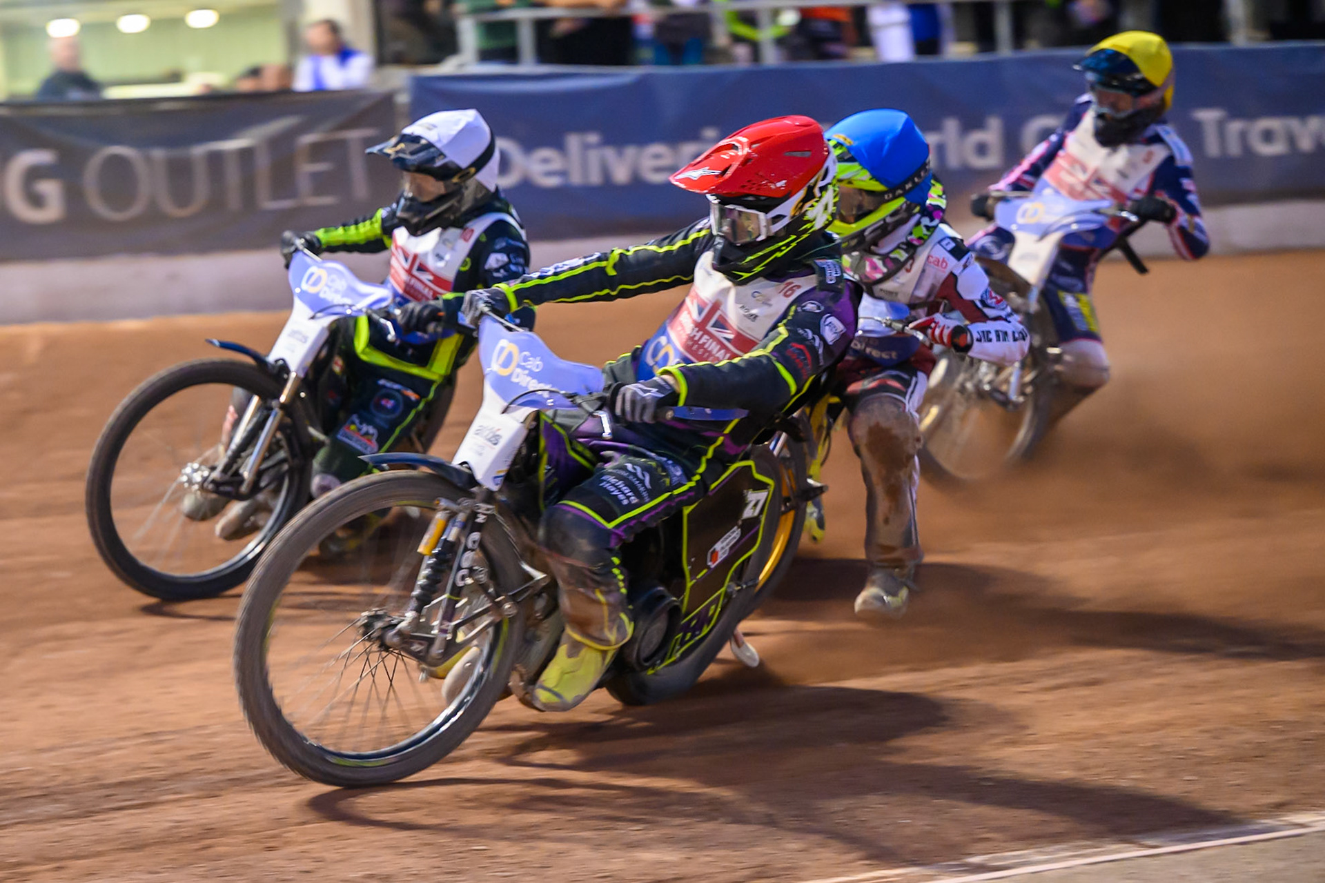 Tom Brennan (16) in Red rides inside Danny King (10) in White with Ace Pijper (3) in Blue  and Adam Ellis (5) in Yellow  behind during the Cab Direct British Speedway Championship Final at the National Speedway Stadium, Manchester on Saturday 15th August 2026. (Photo: Ian Charles | MI News)
